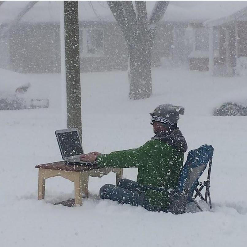 Josh "working from home" when we had 18 inches of snow. Pretty sure the neighbors thought we were crazy staging this photo!