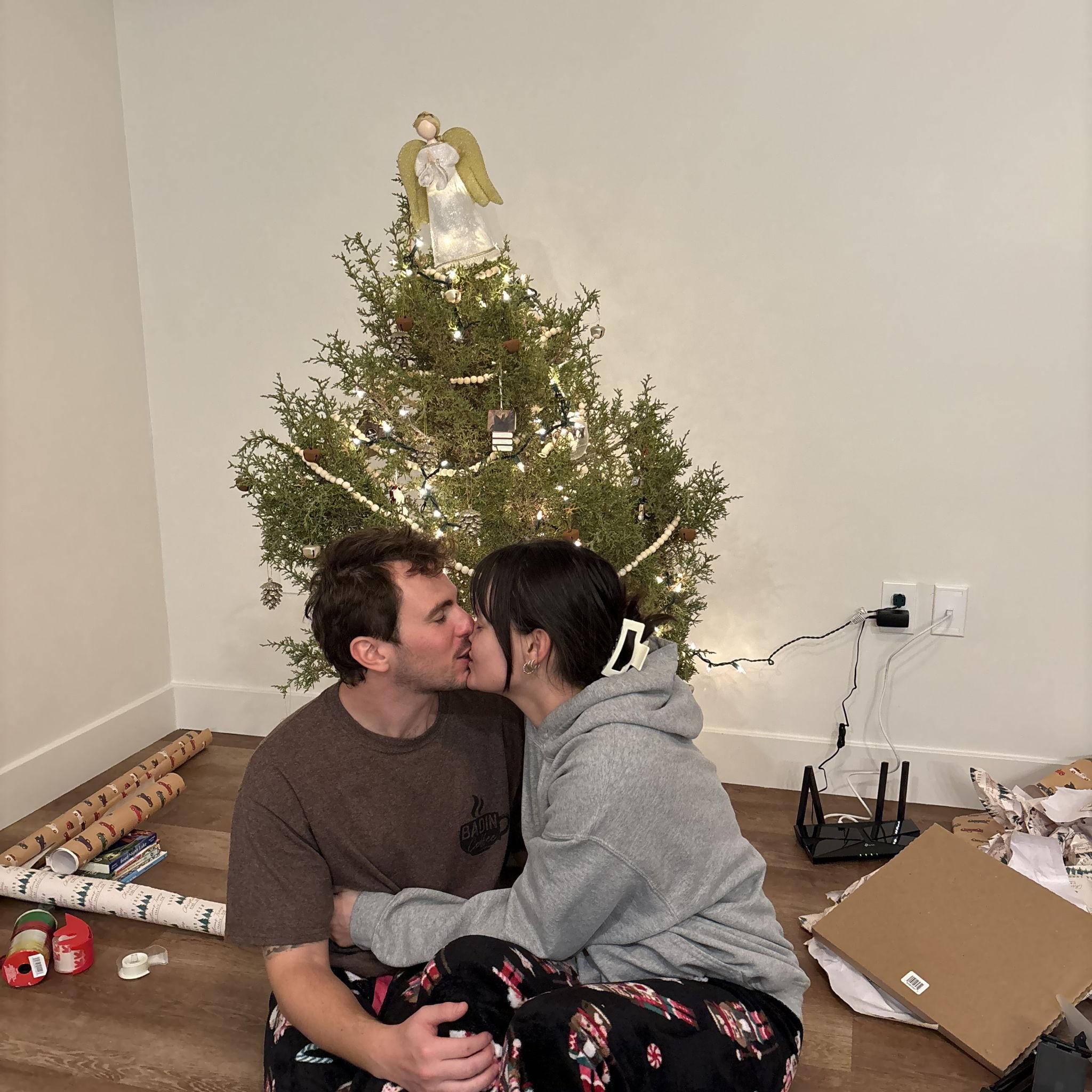 His first pair of matching family Christmas pants.