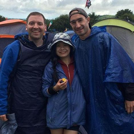 Braving the rains with our friend Brian at the Glastonbury Music Festival in the UK. (Yes, Matt is wearing a garment bag that he brought on the trip and used as an emergency poncho.)