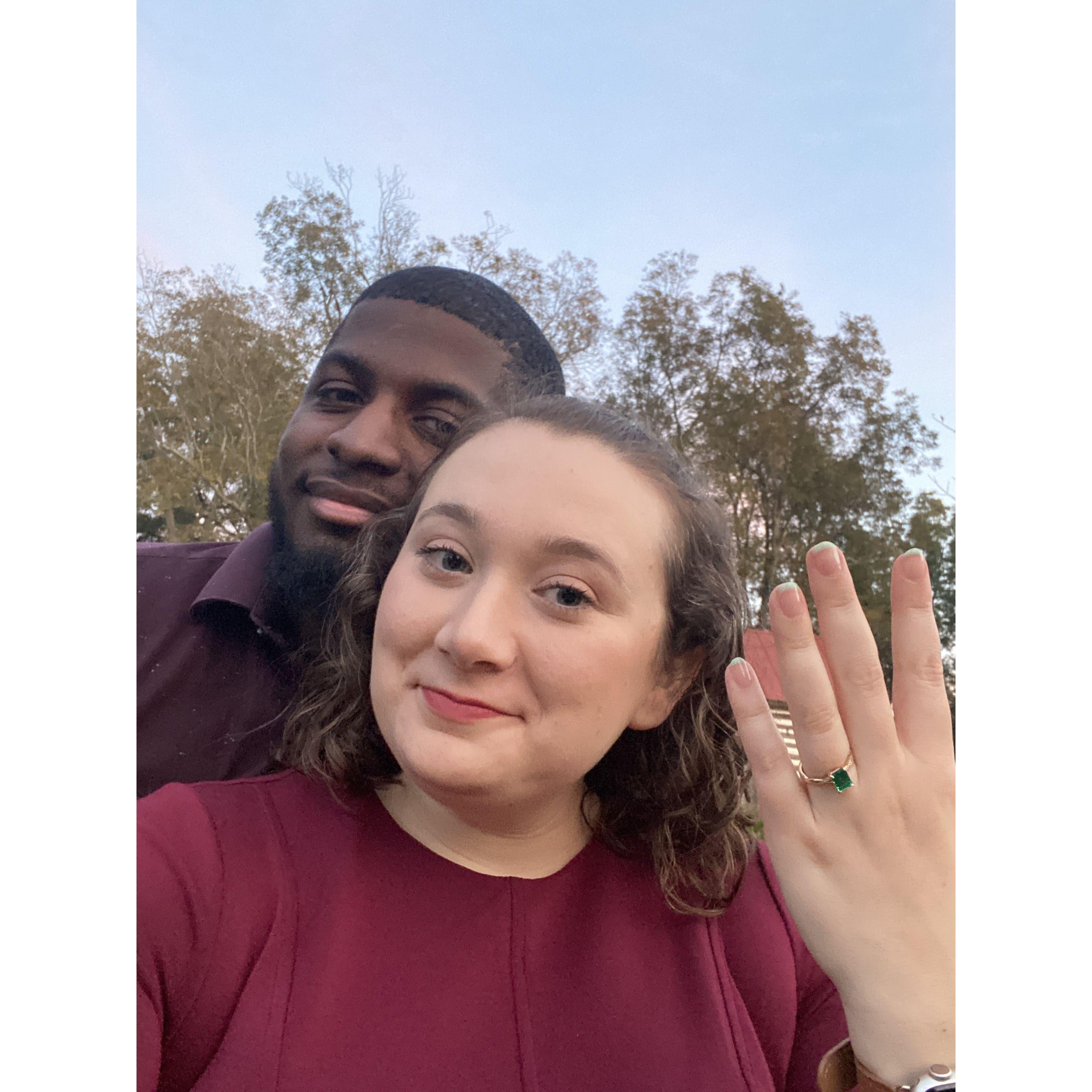 This is the photo we sent to let our families know we got engaged. We're both trying to keep it together for the camera!