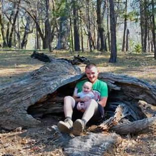 Tyler and Mr. O appreciating nature on our family trip to Barton Flats Campground. Photo courtesy of Steven Widney.