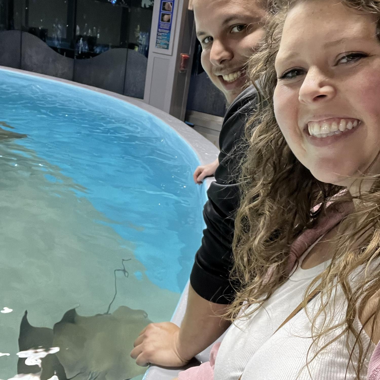 Petting stingrays at the aquarium