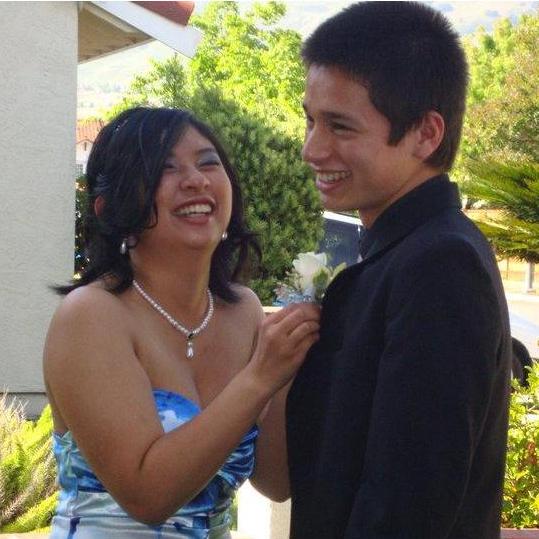 May 2010: Riza stuck me with the boutonnière pin as we were getting ready for her senior prom.