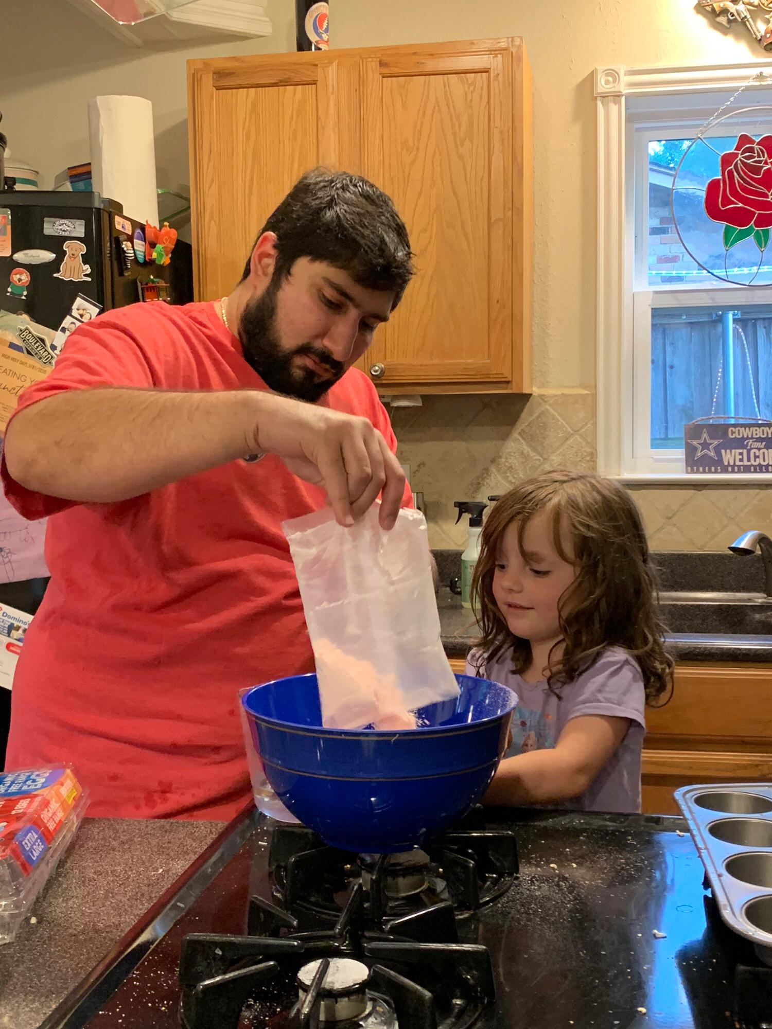 Aaron making cupcakes with their niece, Miss Aubree Paige 2020