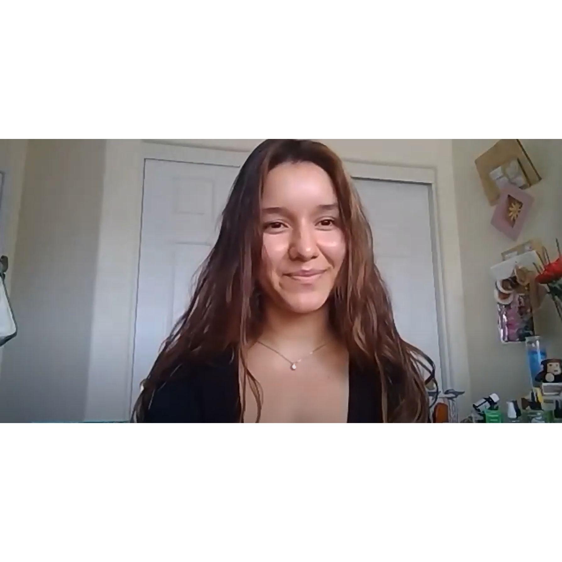 This is Genesis' face moments before she sent Michael her phone number via Zoom chat. Michael barely had enough time to snap a photo of her number before Dr. Lloyd ended the last class' Zoom session!