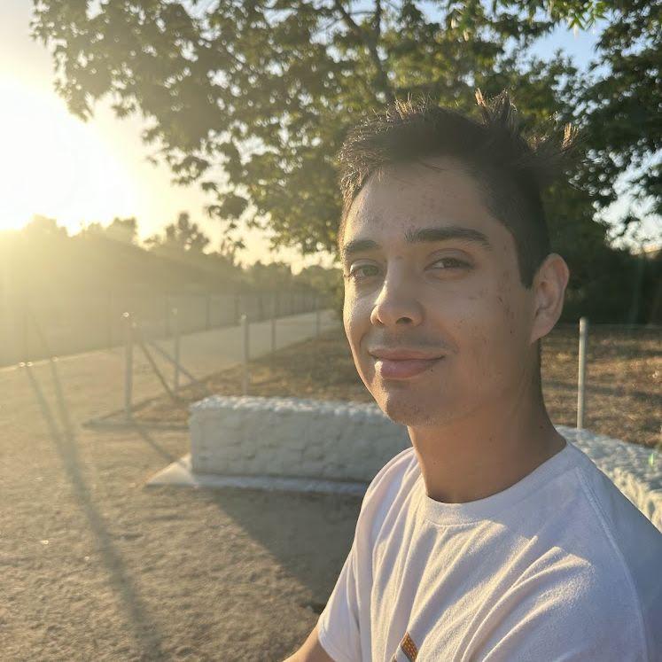 Lola took this photo of Peter right before he proposed because she though the sun was pretty on his face, She had no idea what was going to happen in a few minutes.