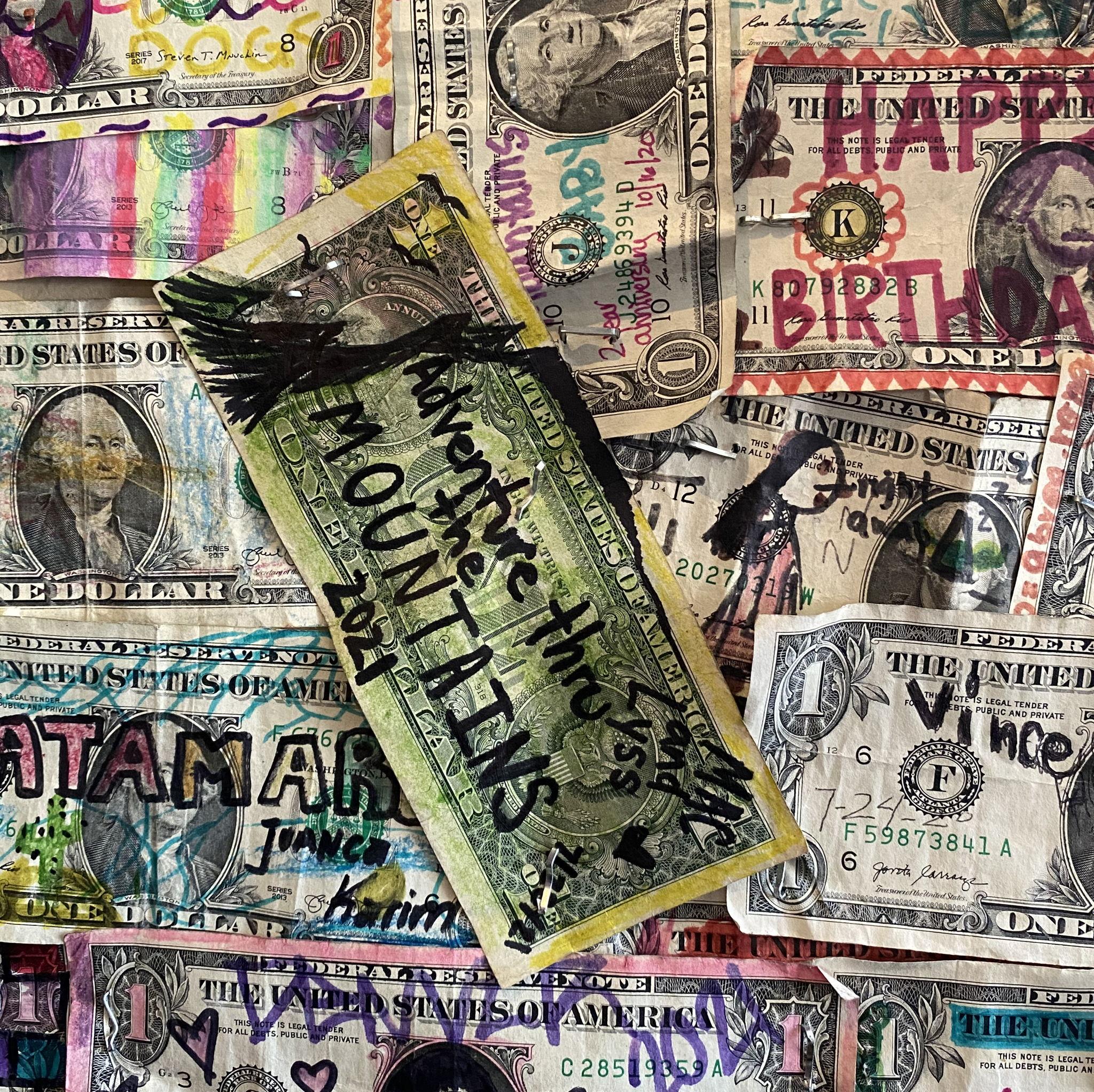 I wonder if this dollar is still at this restaurant Mac and I ate at in Colorado..