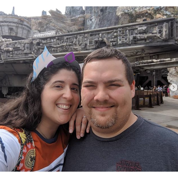 Living our best Star Wars life at Batuu with Millennium Falcon behind us.