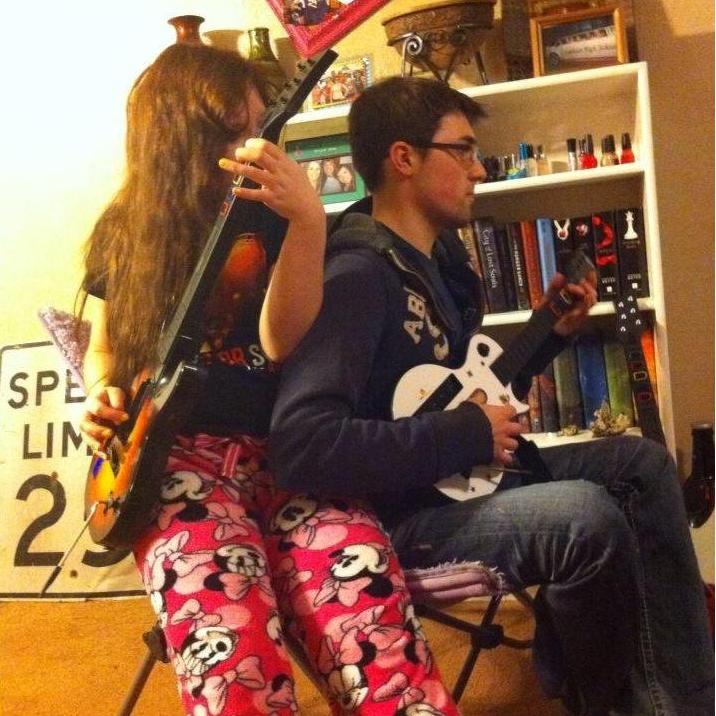 This is another photo of our early days together. Many nights of 2013 and 2014 were spent playing guitar hero in the old house on Rose Street. :)