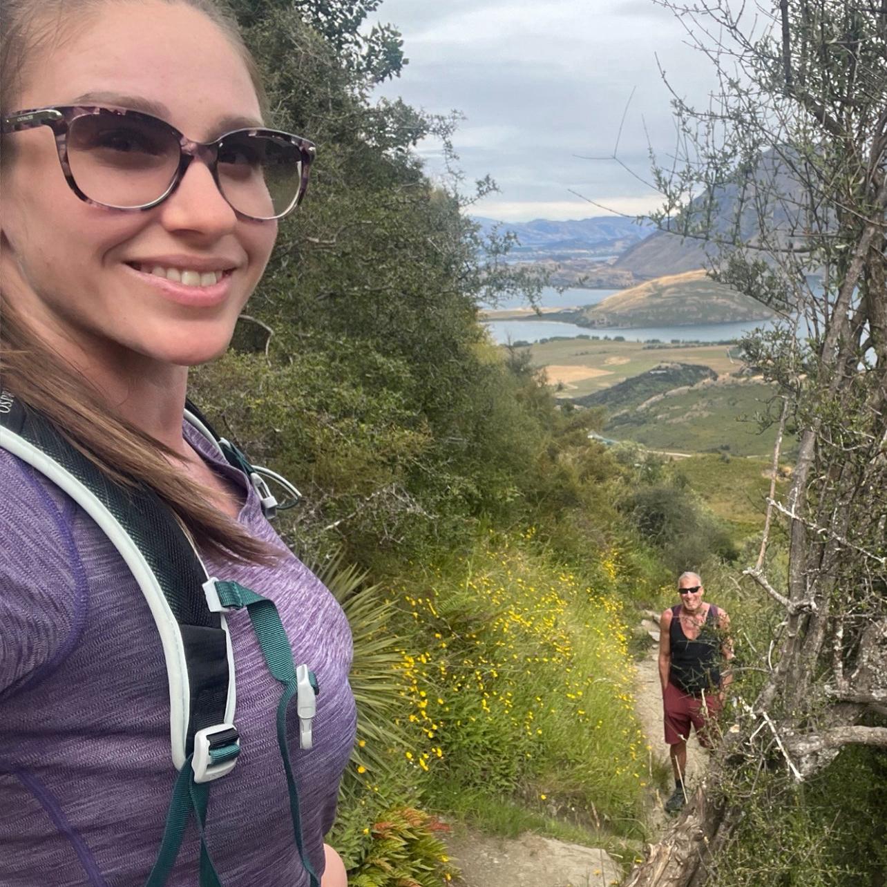 Hiking Rocky Mountain Trail overlooking Lake Wanaka and Lake Hawea.