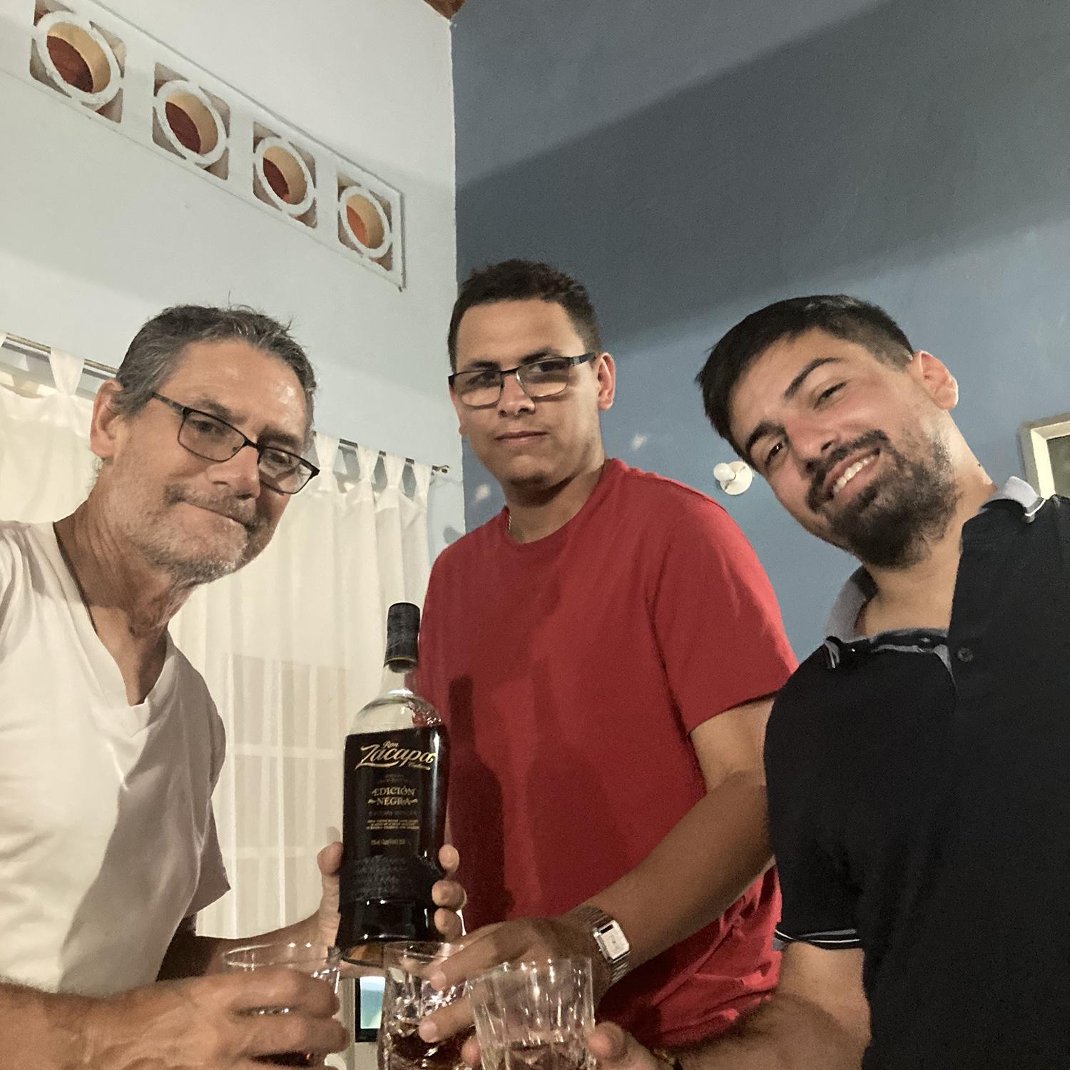Drinking rum with Maia's family at home