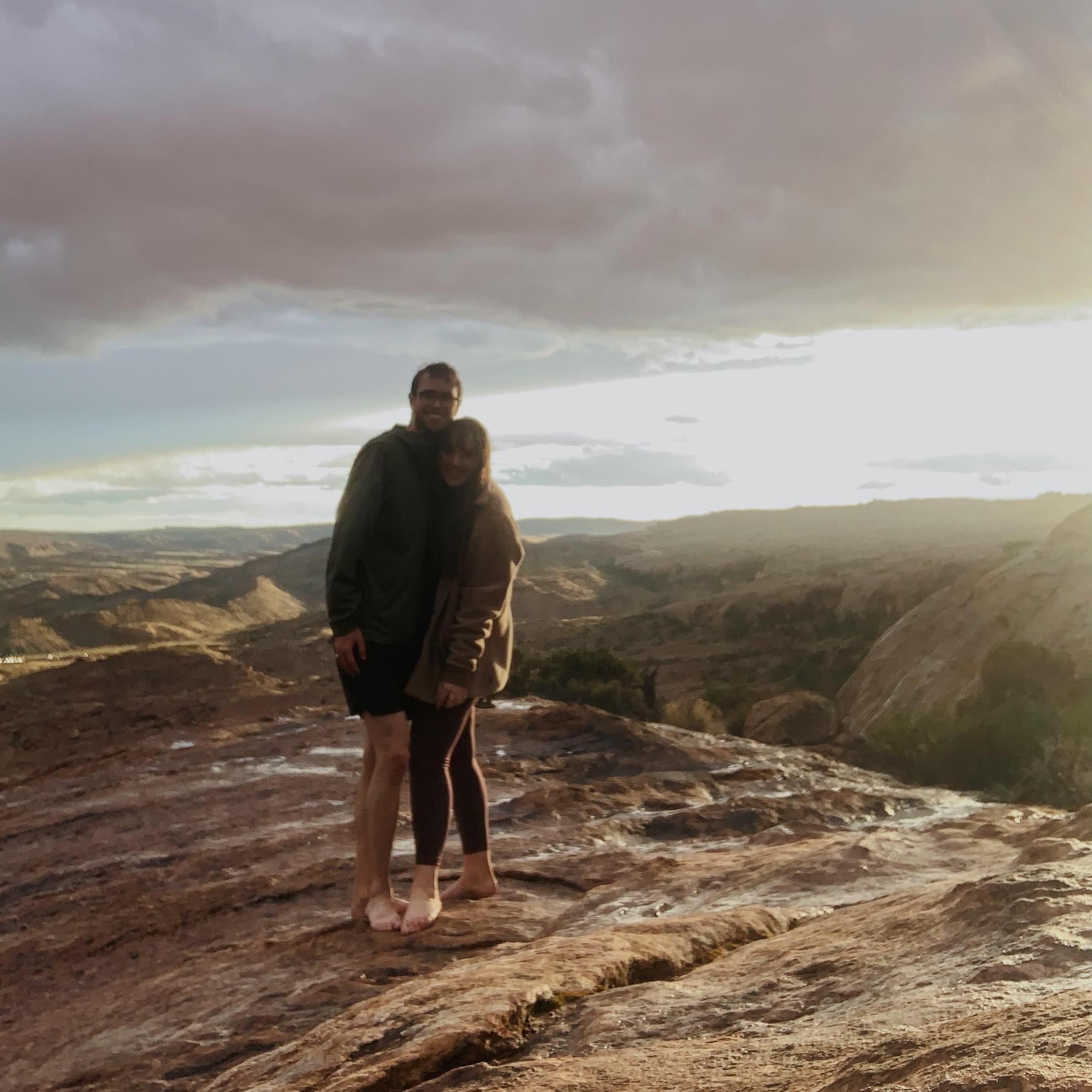 This was taken on our road trip, in Arches National Park! We hiked to Delicate Arch and it started monsooning on the way down, haha! We took a self timer when the rain stopped and we were drenched!