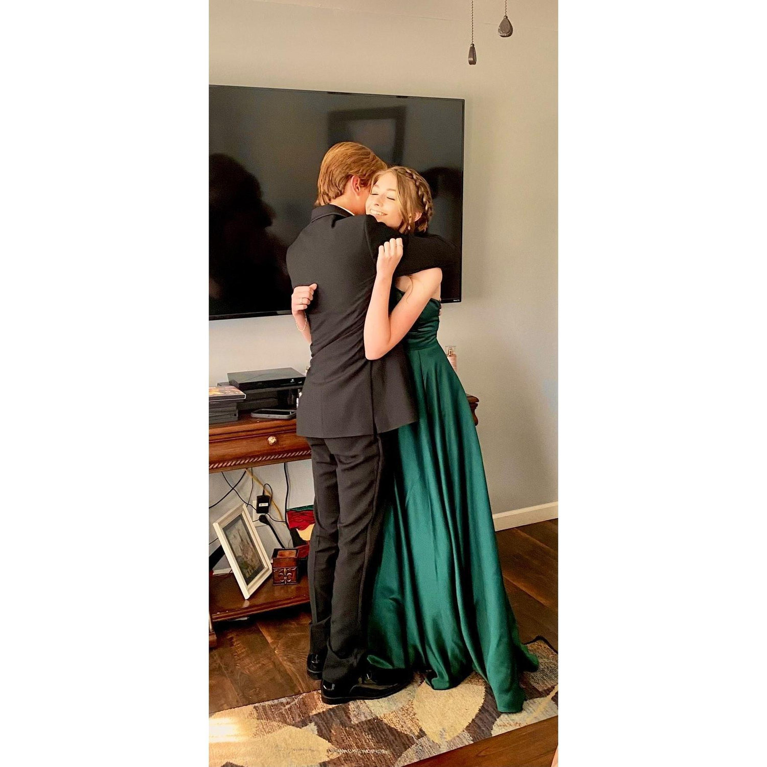 This is to this day perhaps our most favorite memory. It is when we first saw each other dressed up for prom and this embrace we can still feel today.