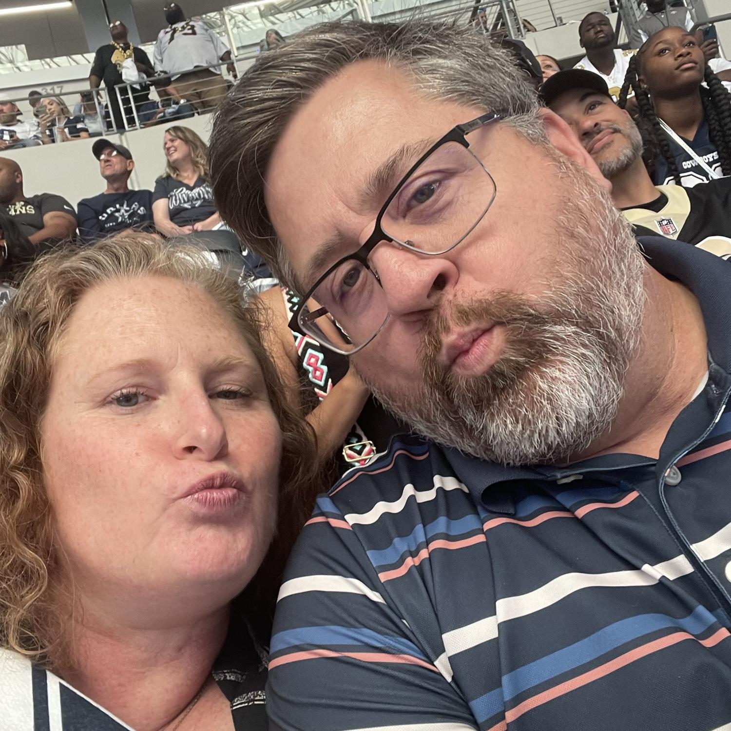 Barry teaches Lori to love football. Go Dallas Cowboys!!
