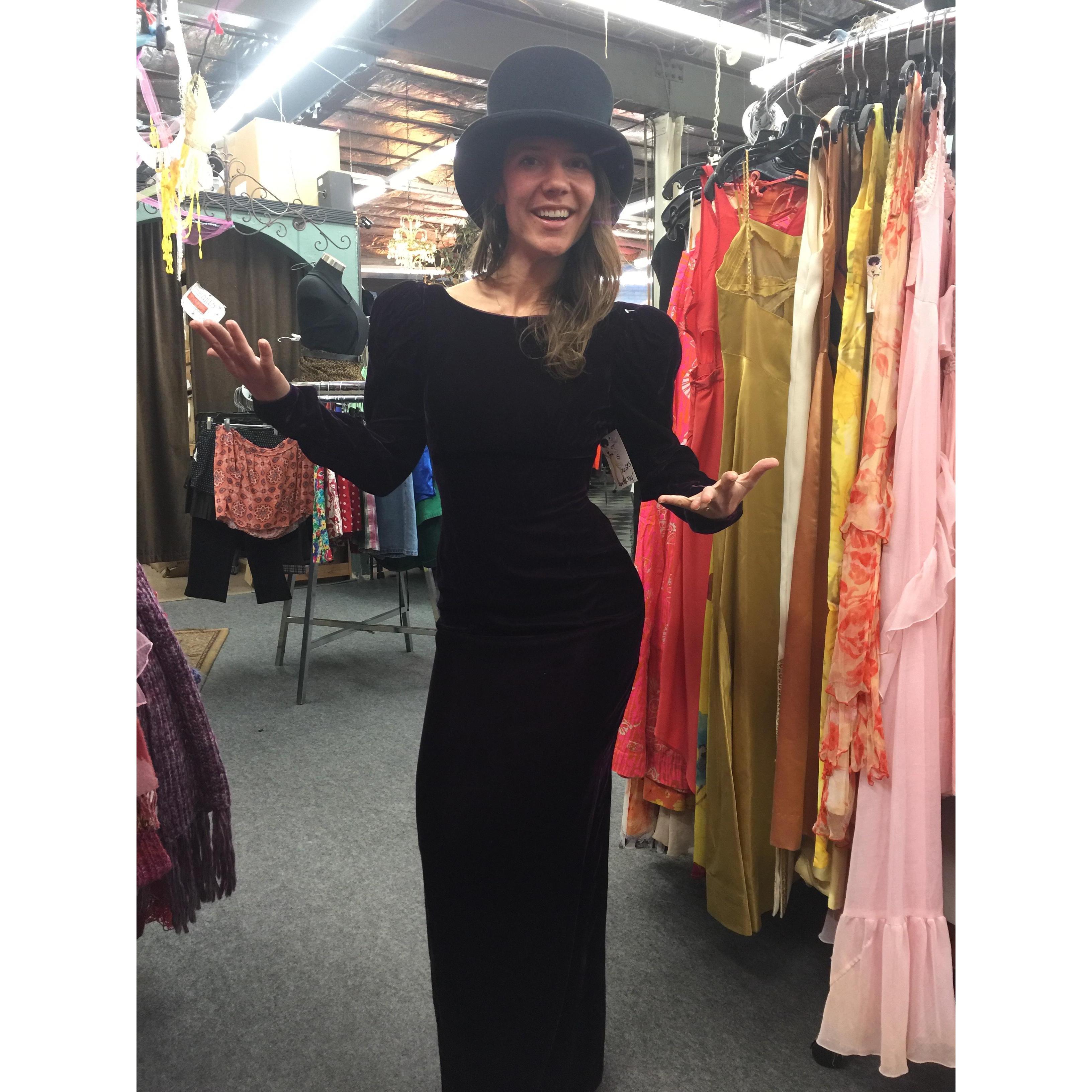 Meet Andrea, Lynn's best friend. She is modeling potential dresses for the wedding at a local costume shop.