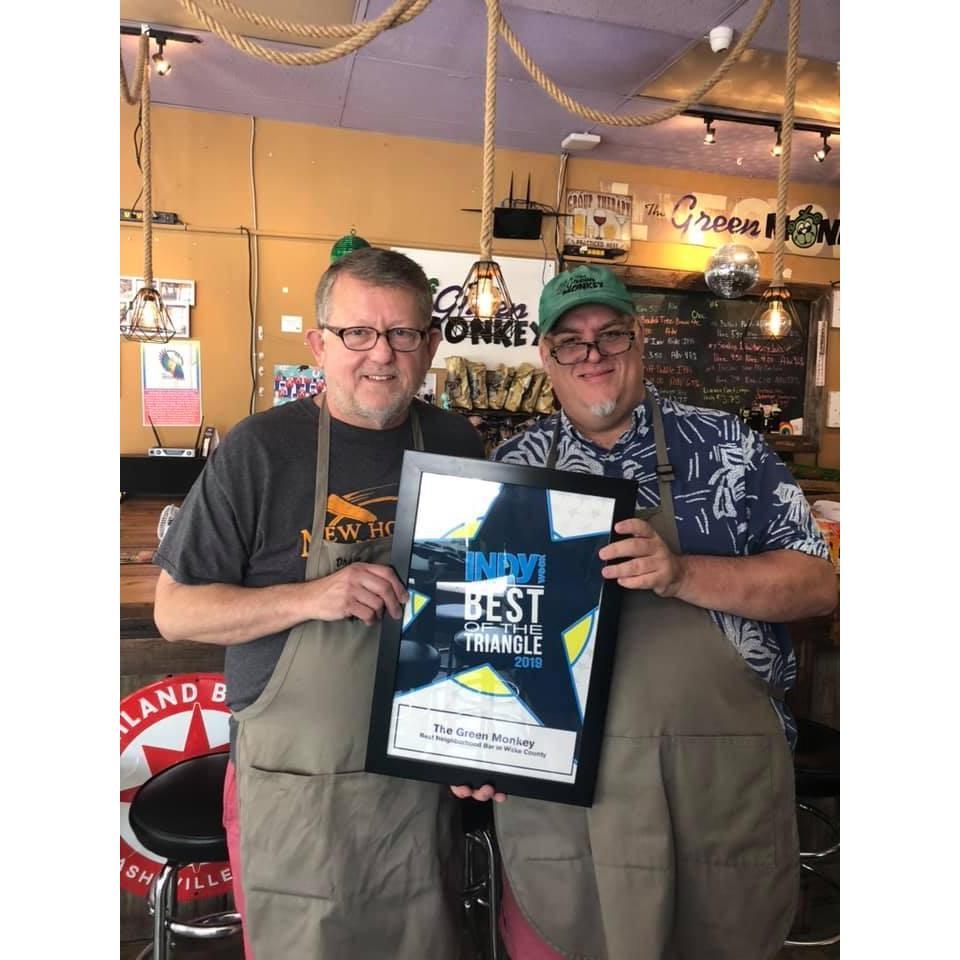 We are both so proud of this picture! It happened this summer when we were voted by Indy Readers for best Neighborhood Bar!