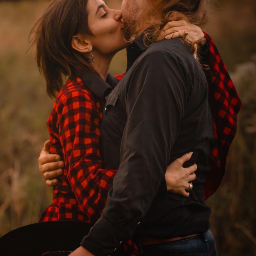 It's hard to kiss and smile at the same time, but love will find a way