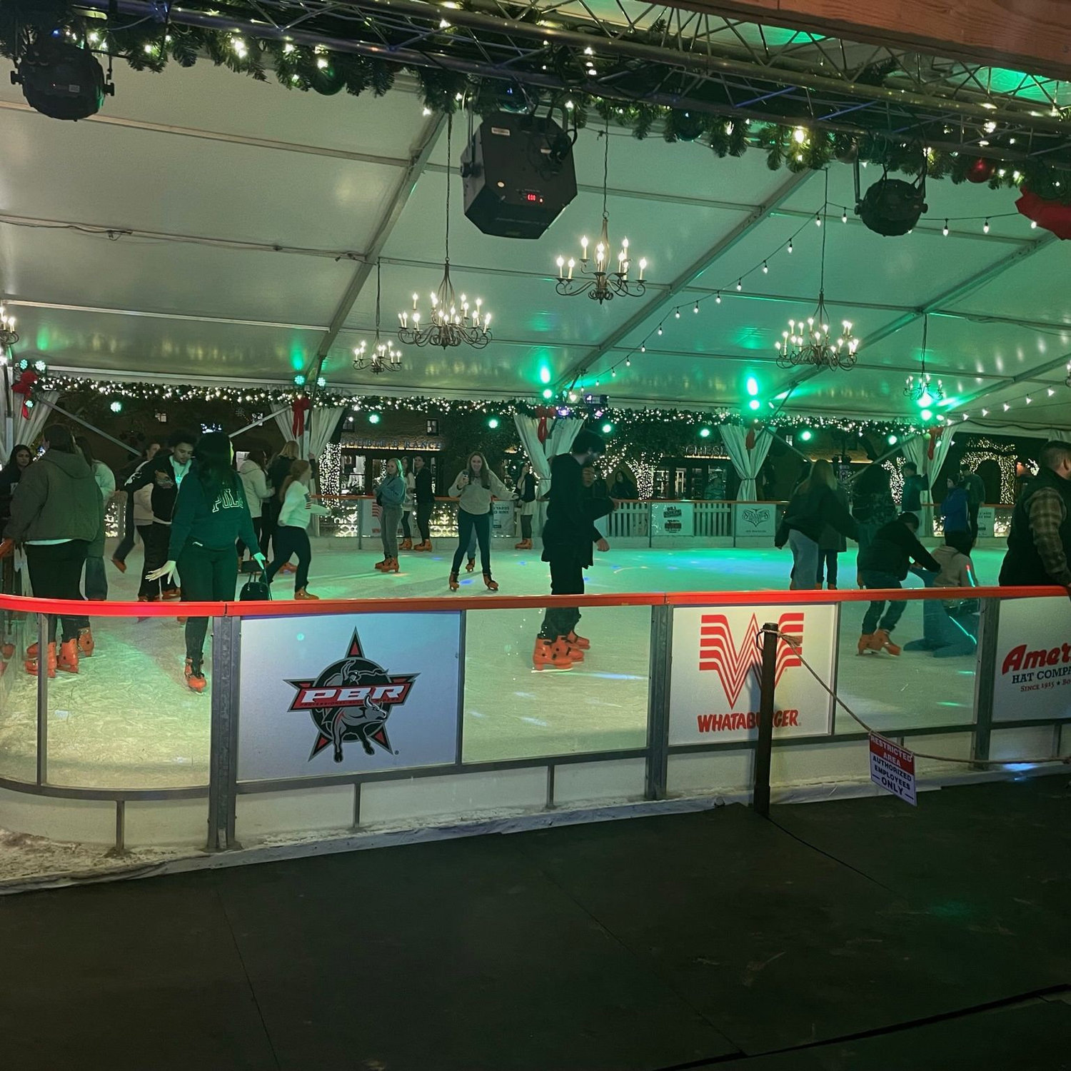 This is the closest thing they have to a first date photo--taken at their second date in the Stockyards (the day Charley asked Jay to be his girlfriend). They spontaneously decided to go ice skating!
