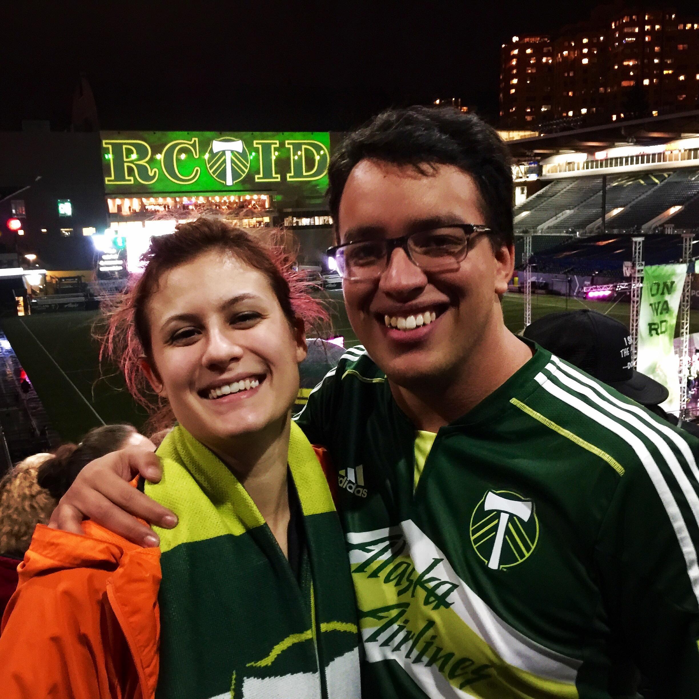 Tony became such a huge Timbers fan during their time in Portland that he got a tattoo of their emblem after they won the MLS cup. Ali is just a fan by proxy (she likes the scarves).
[Providence Park]