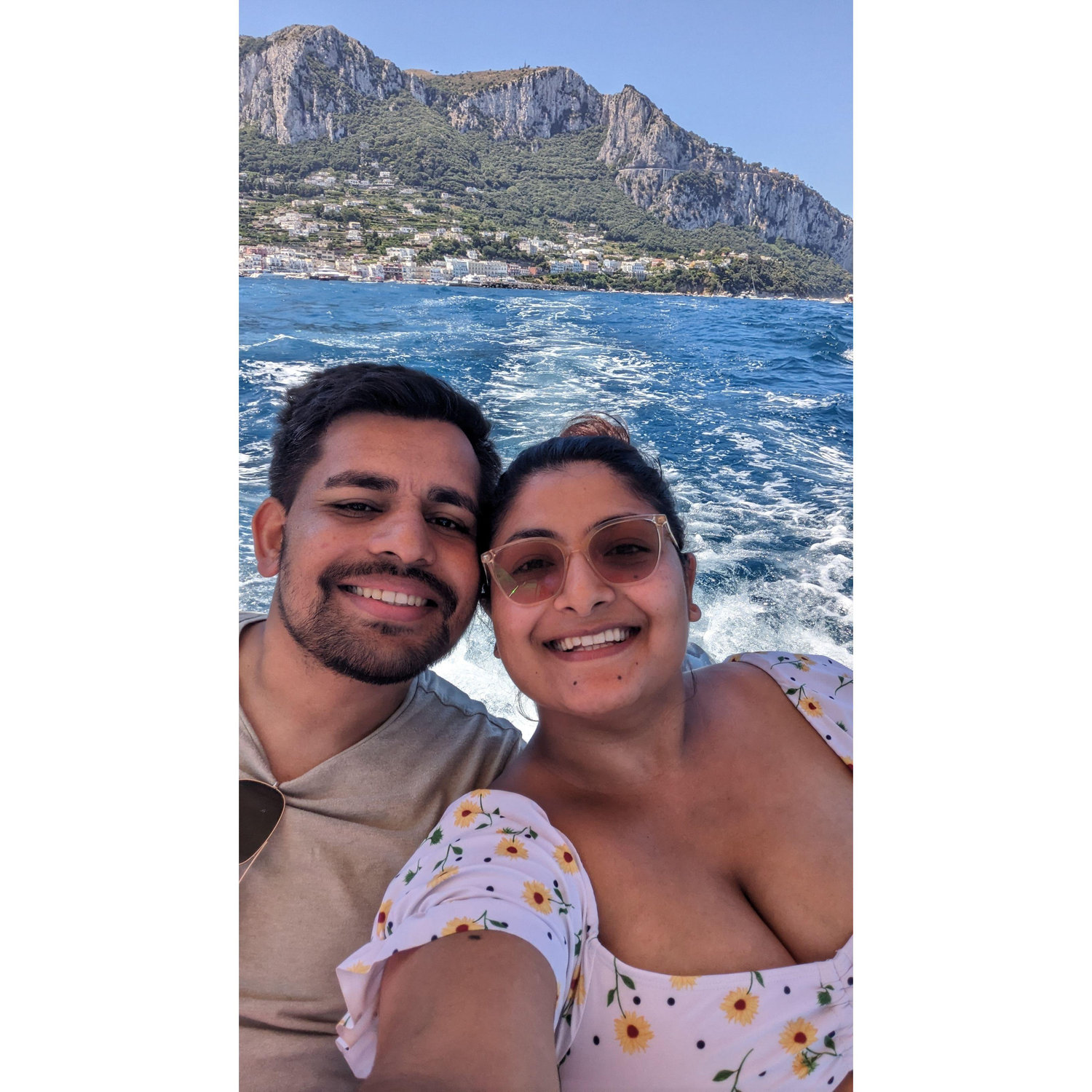 Boat ride to Capri. For those who know one of us cant swim and was forced to smile for a picture here.