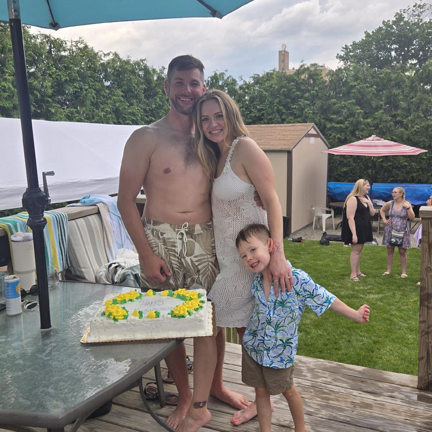 More engagement party fun featuring our cake and my little nephew Jett!