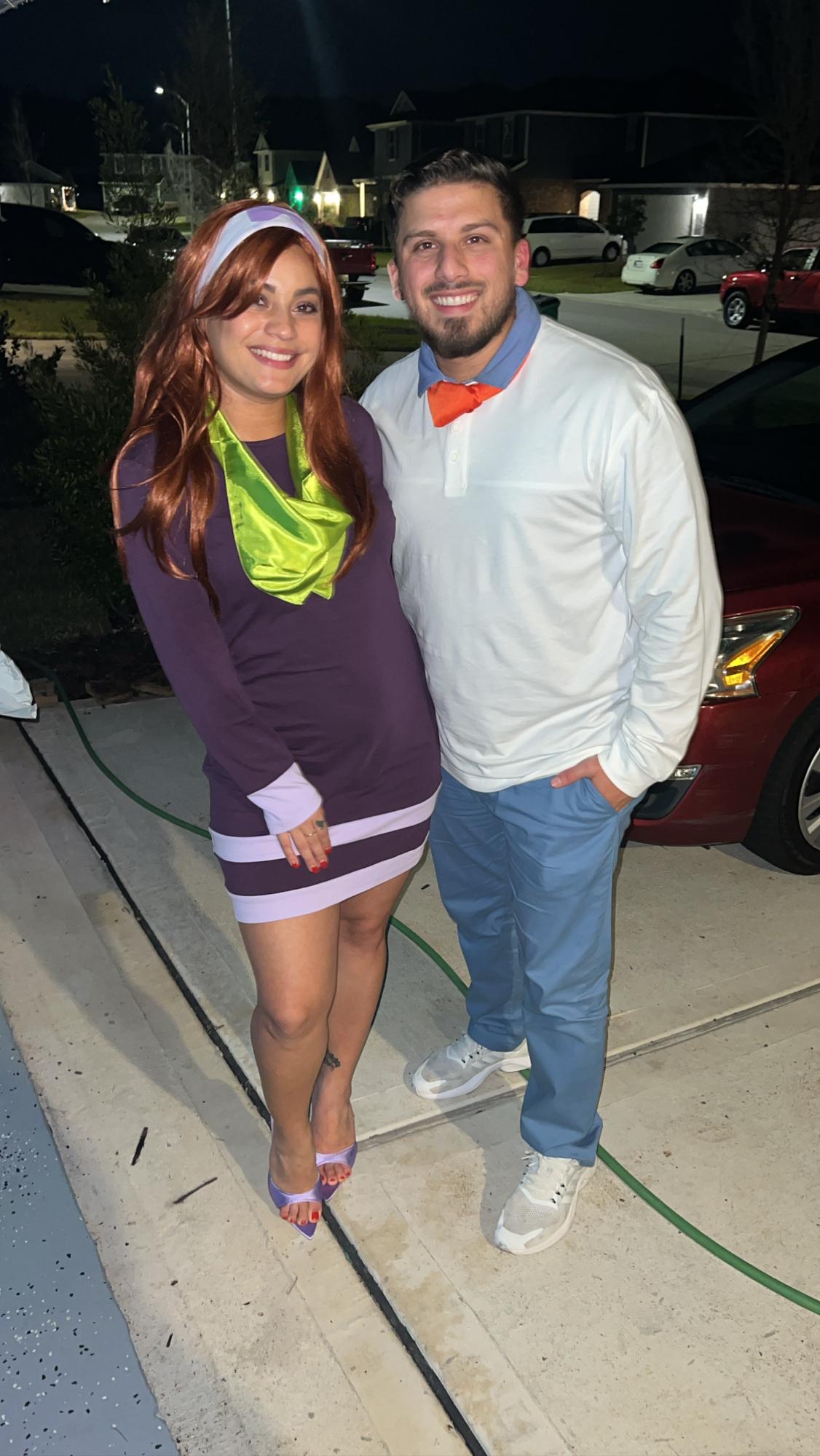 Dressing up as Daphne and Freddie for Halloween.