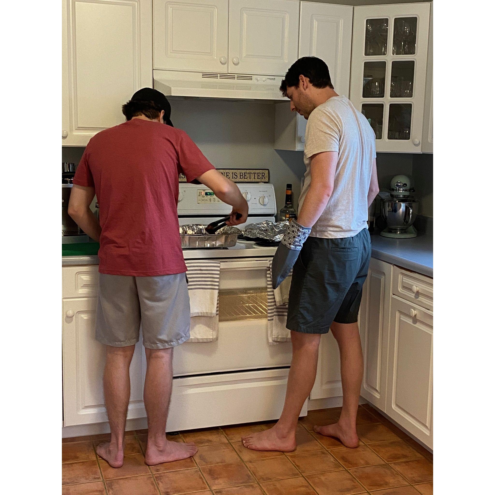 Marc and friend Mark whipping up a meaty masterpiece