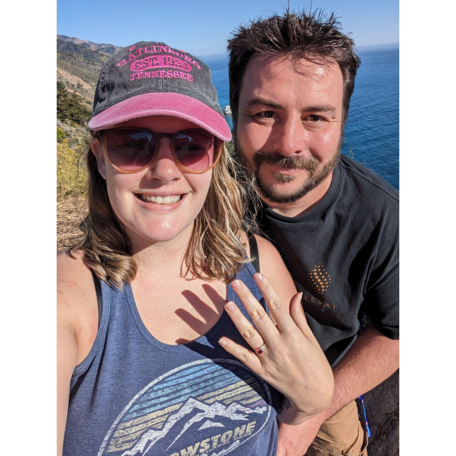 Engaged on a bright sunny day