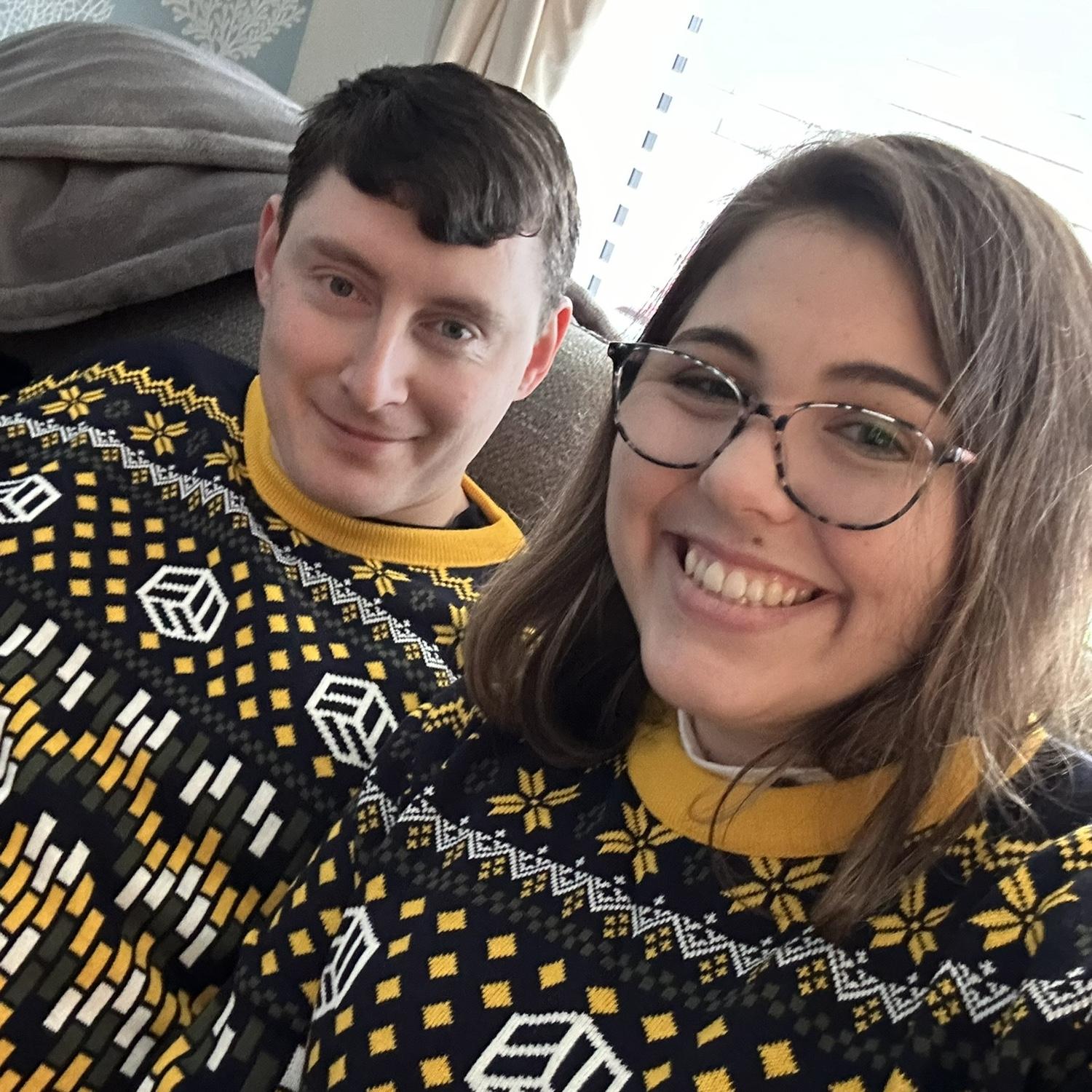 Surprising each other with ugly Christmas sweaters!