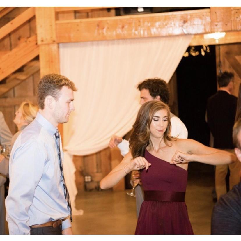 Stian may not be showing it in this picture, but we love a wedding dance floor. A lot of time and care have gone into crafting our wedding playlist.