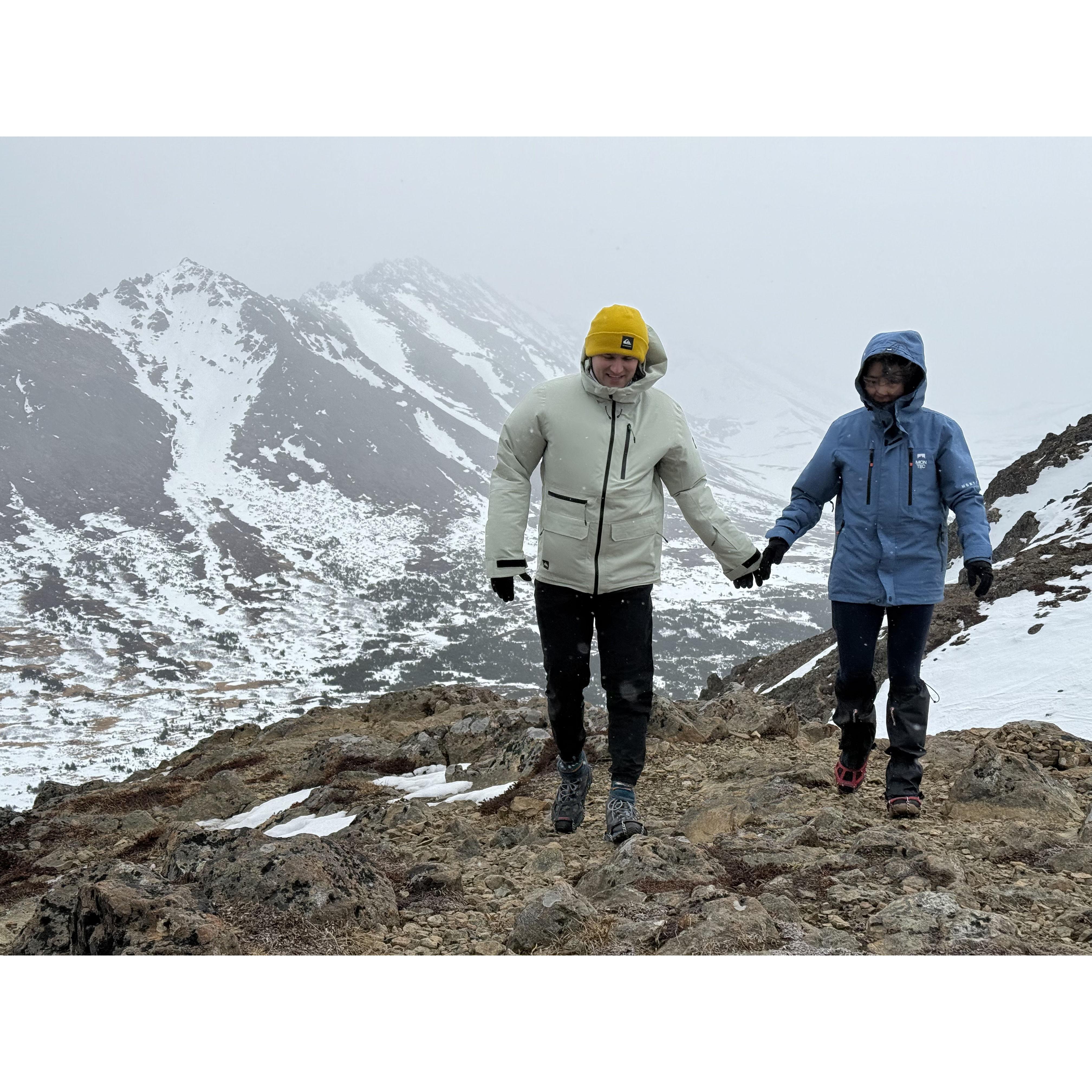 Hiking in Alaska. It was very windy and cold! (photo credit: Dasha. April 2025)