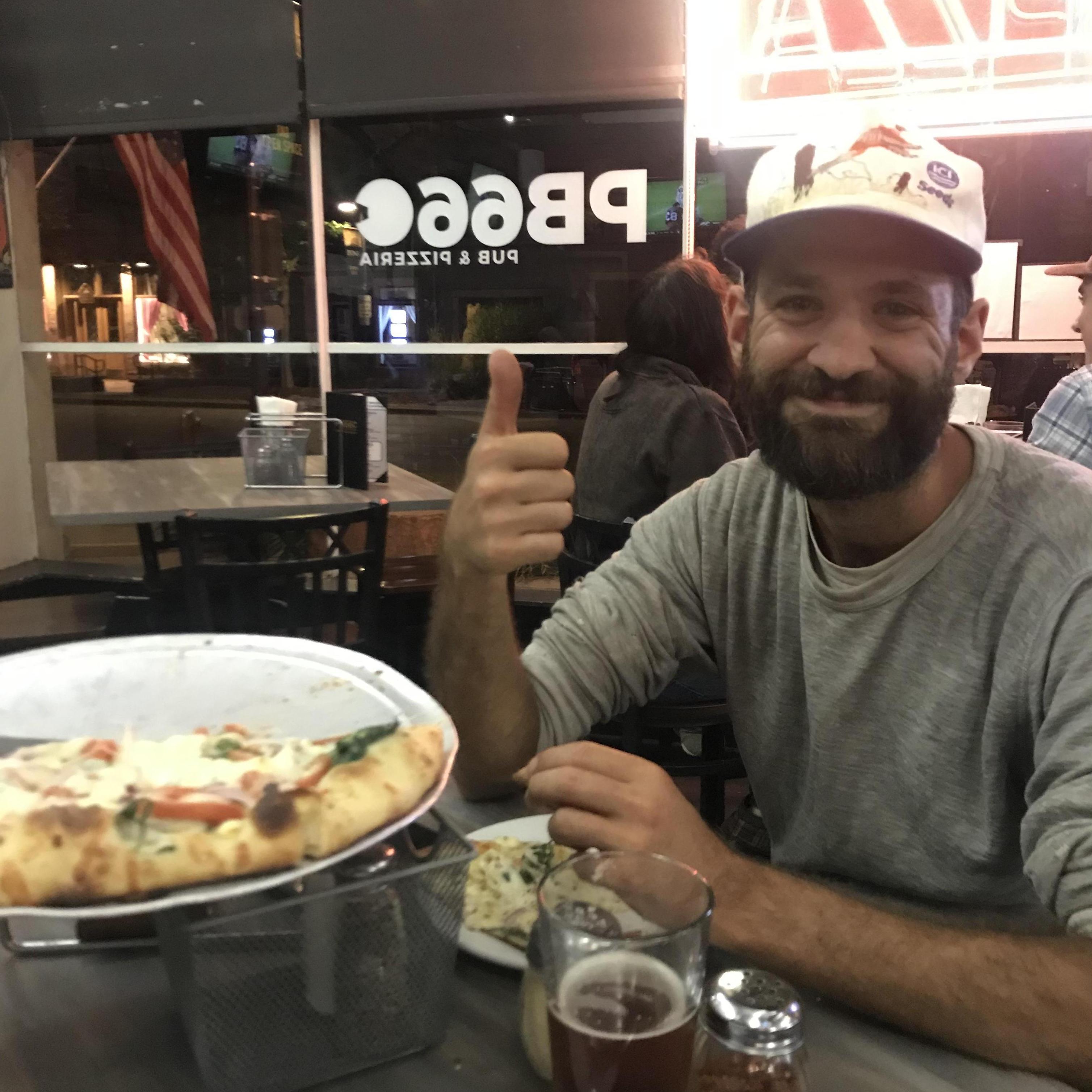 Post-chicken slaughter pizza and beer tradition