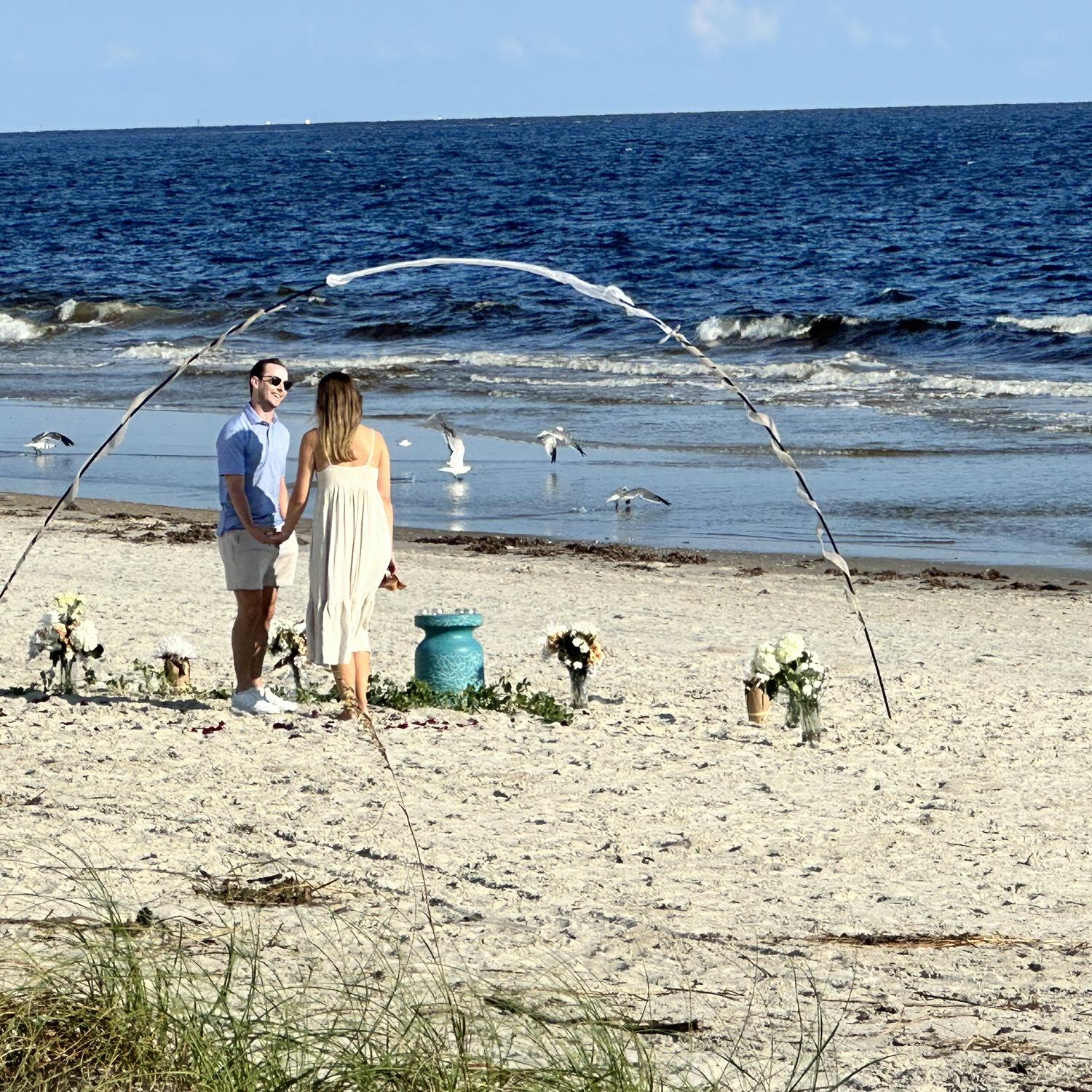 Colin proposing in Oak Island, NC