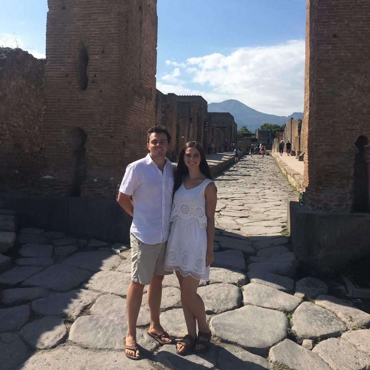 Standing in the ruins of Pompeii with Mount Vesuvius looming in the background