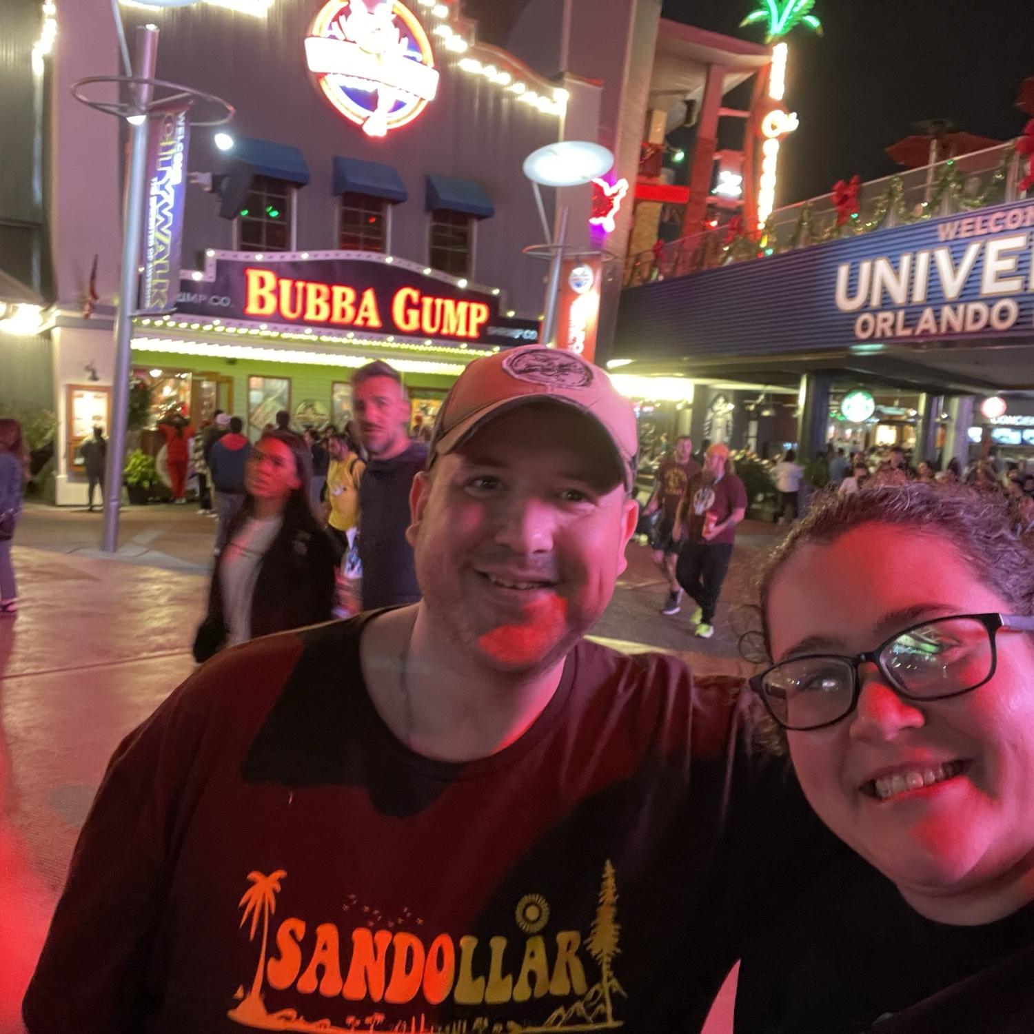 Us in universal in front of bubba gump two months after we were forest and Jenny for Halloween