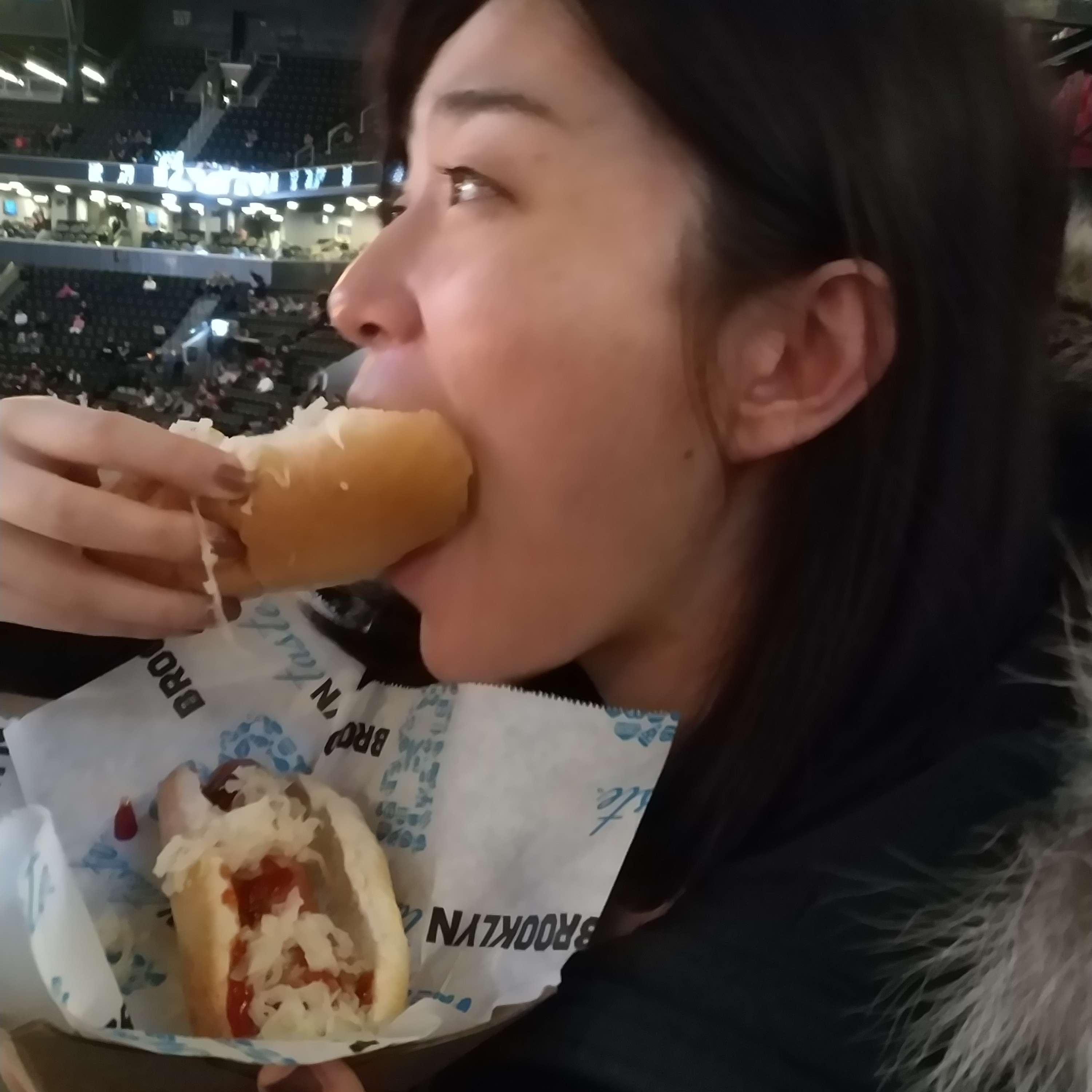 Here is Jamie enjoying a hotdog at an NBA game.