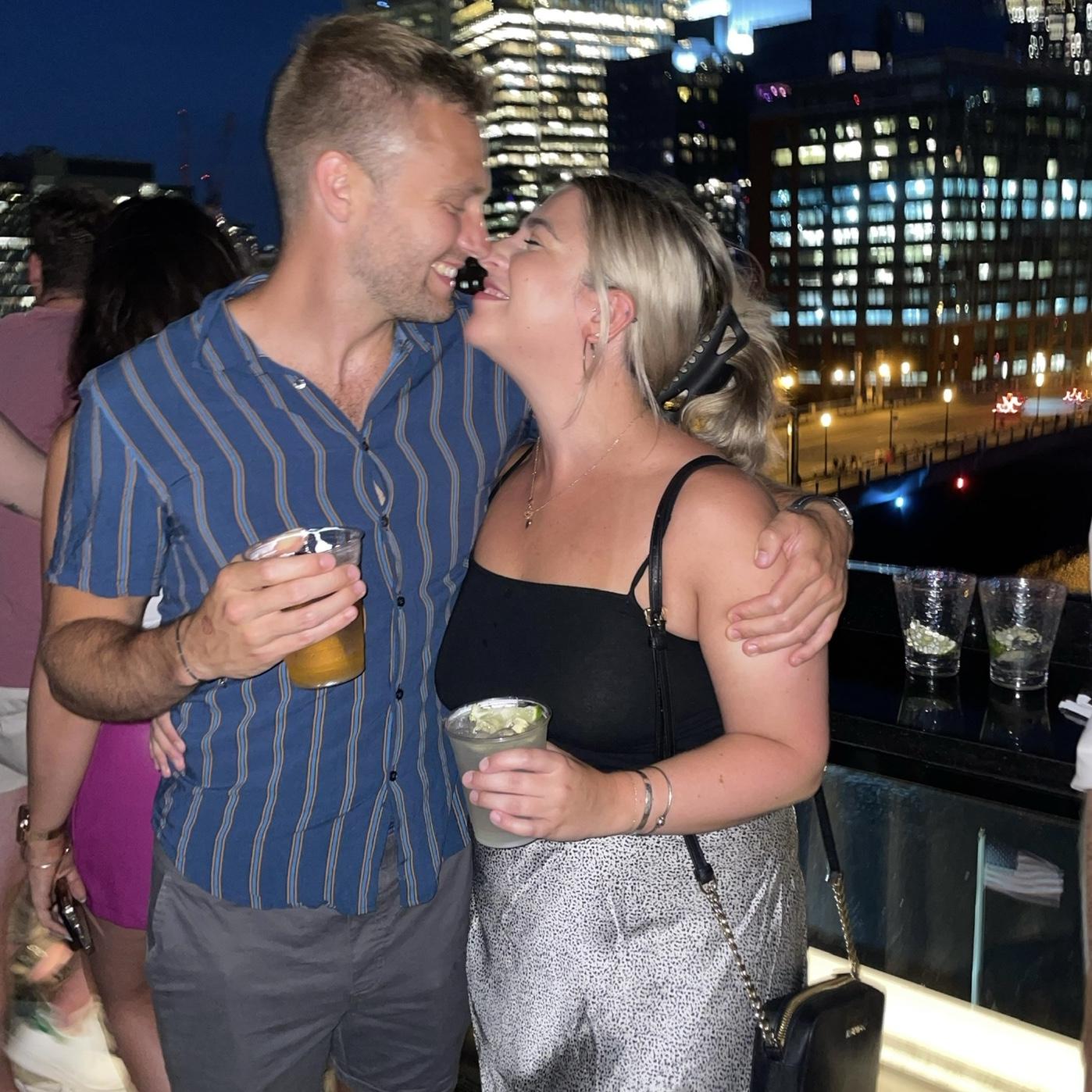 Enjoying drinks on a rooftop bar in Boston!