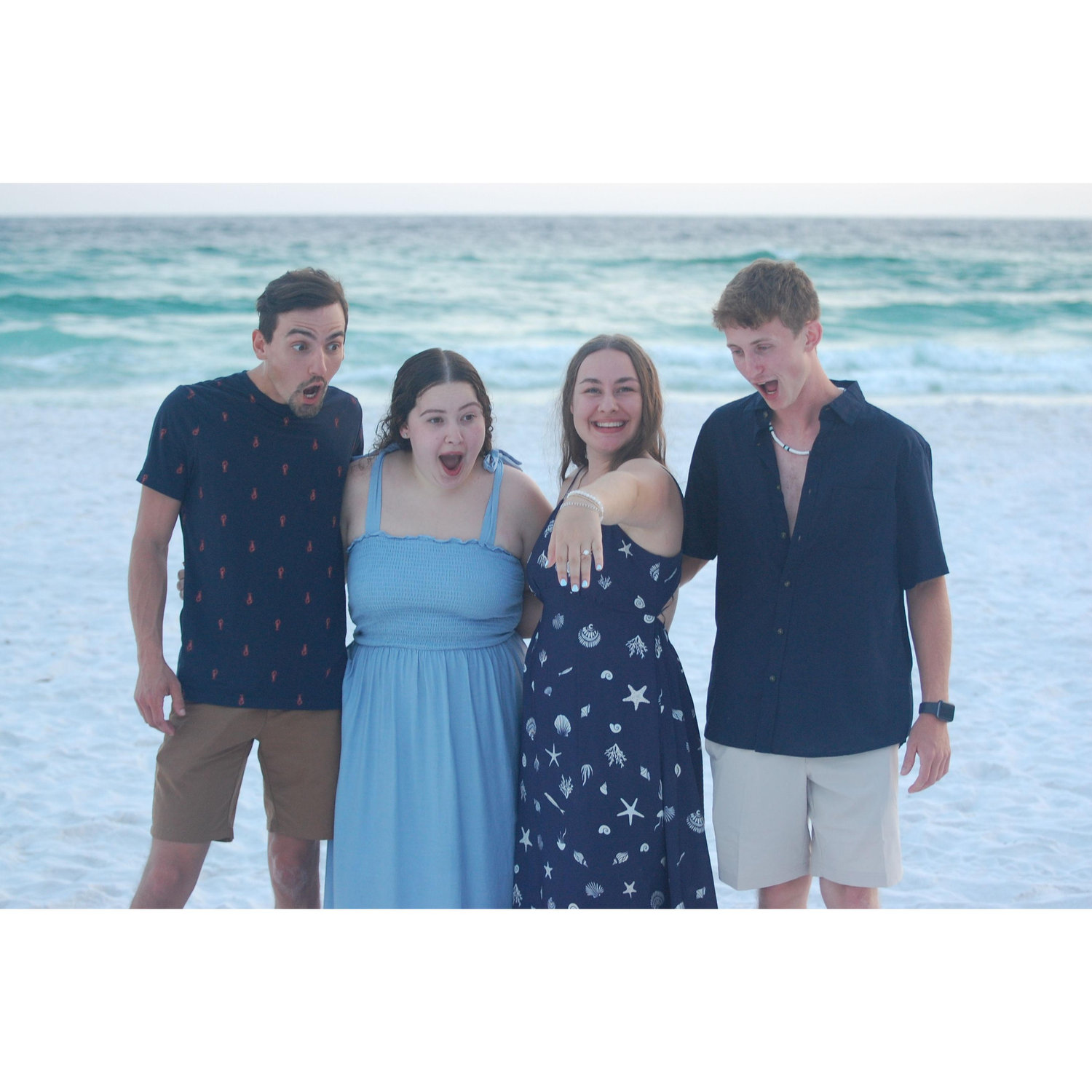 Surrounded by love and a little bit of theatrical disbelief- my sister, her husband, and my fiancé celebrating moments after the proposal!