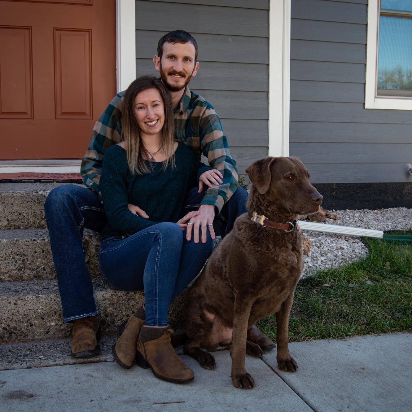 Sitting on the front steps of our first house. November 2023