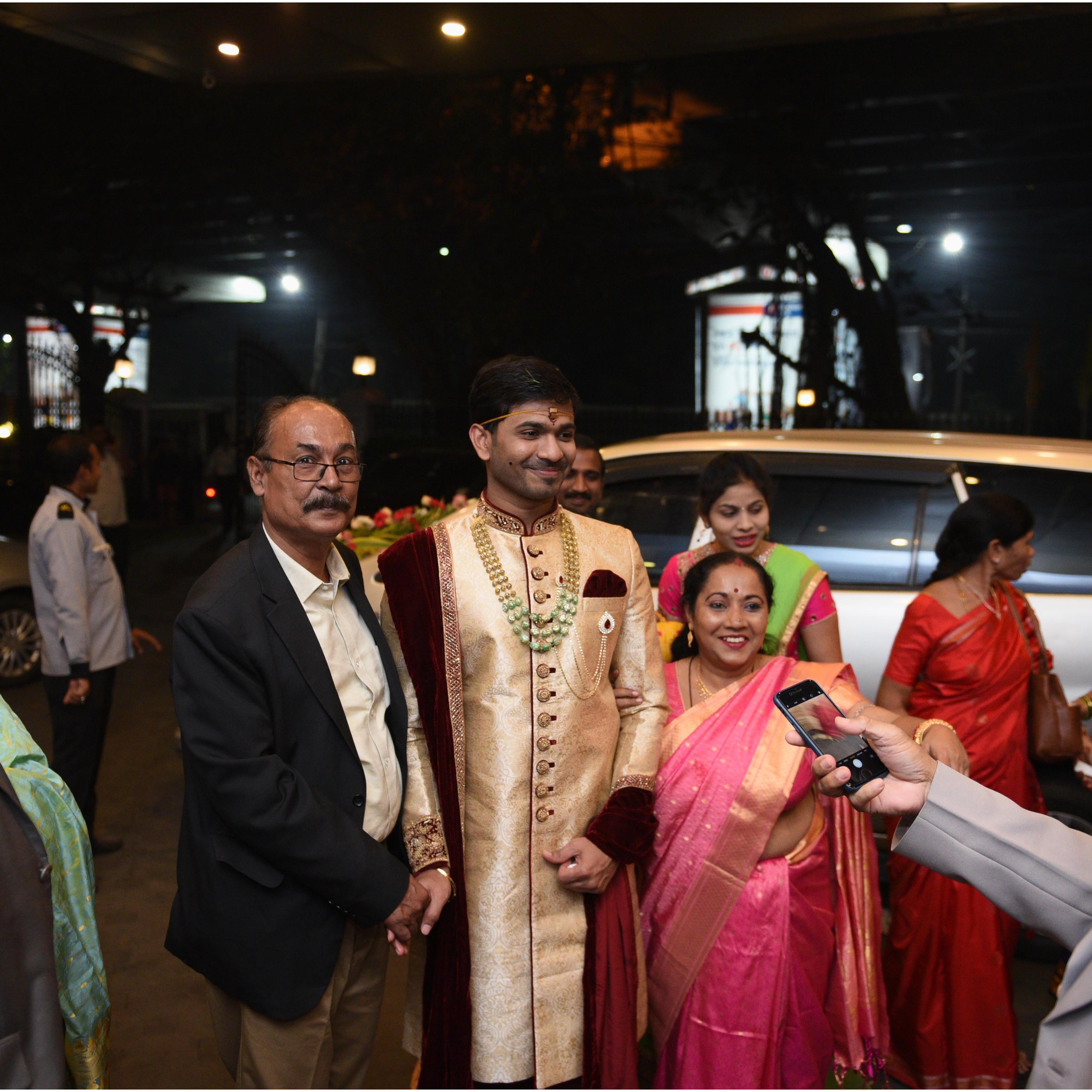 Her parents welcoming groom