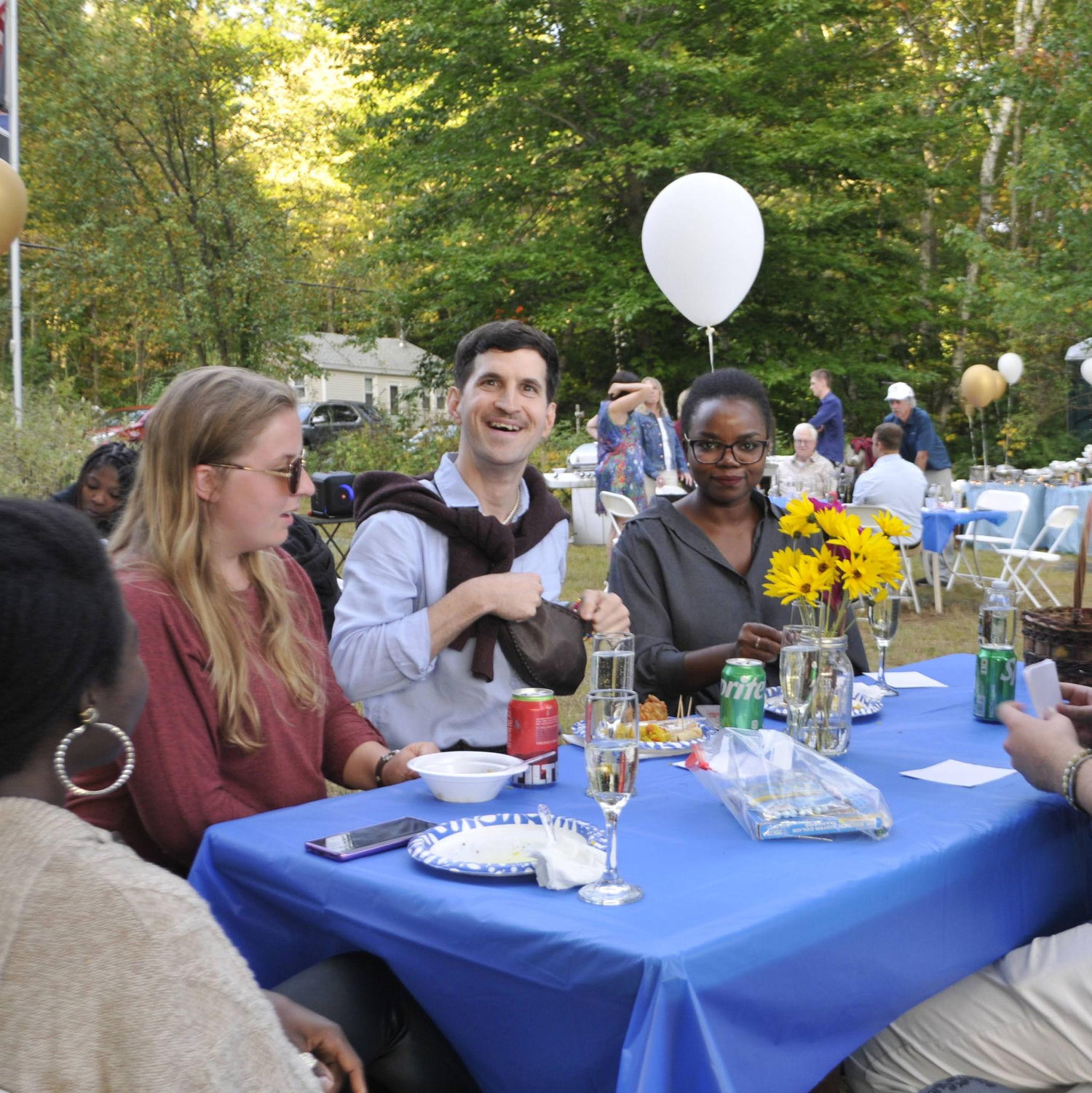 Some of Lidia's friends enjoying the meal at our engagement party.