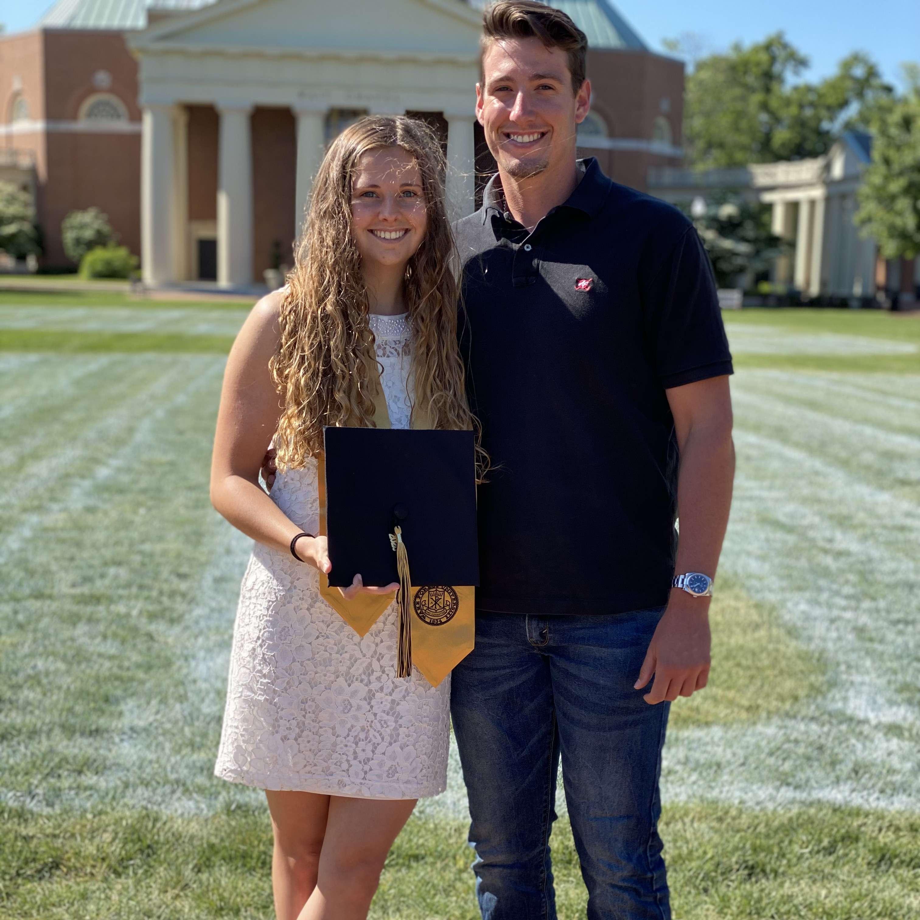 May of 2020 when Courtney graduated from Wake Forest, Mitch is rocking a haircut that his younger brother CJ gave him during COVID