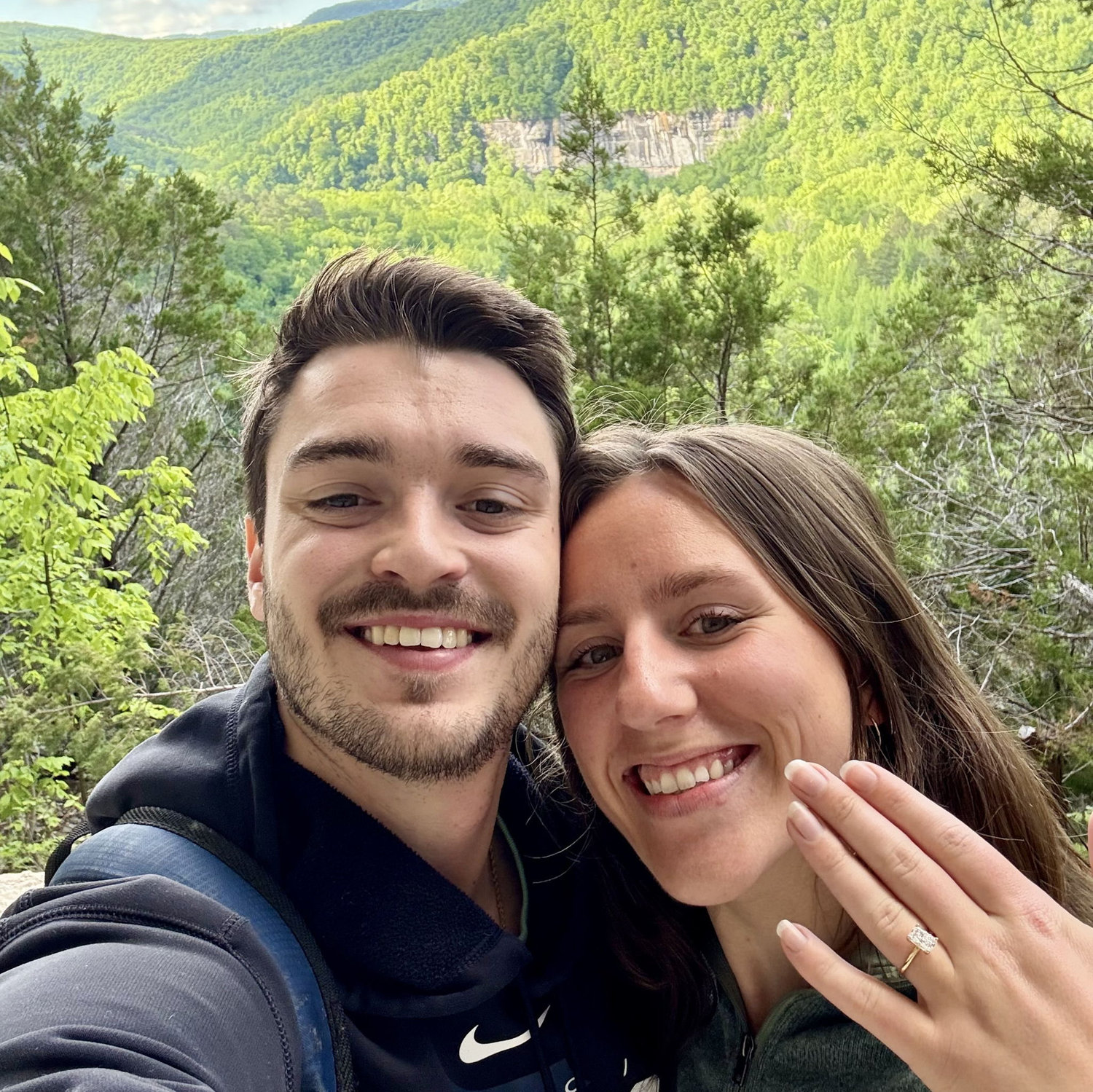 Drake proposed in Ponca, Arkansas where we were hiking on the beautiful Goat Trail!