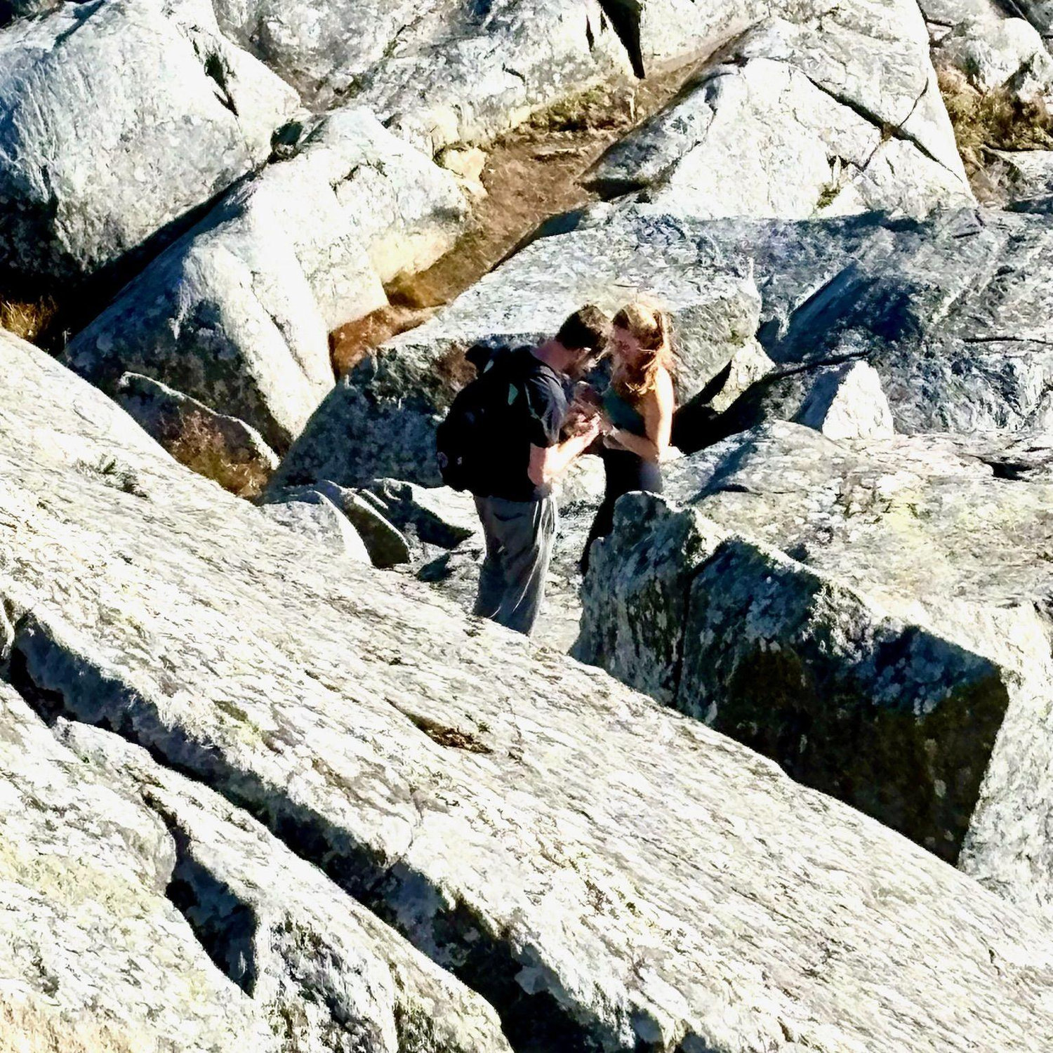 This picture was taken by a stranger who witness Evan proposing and thought "I bet they will want pictures"