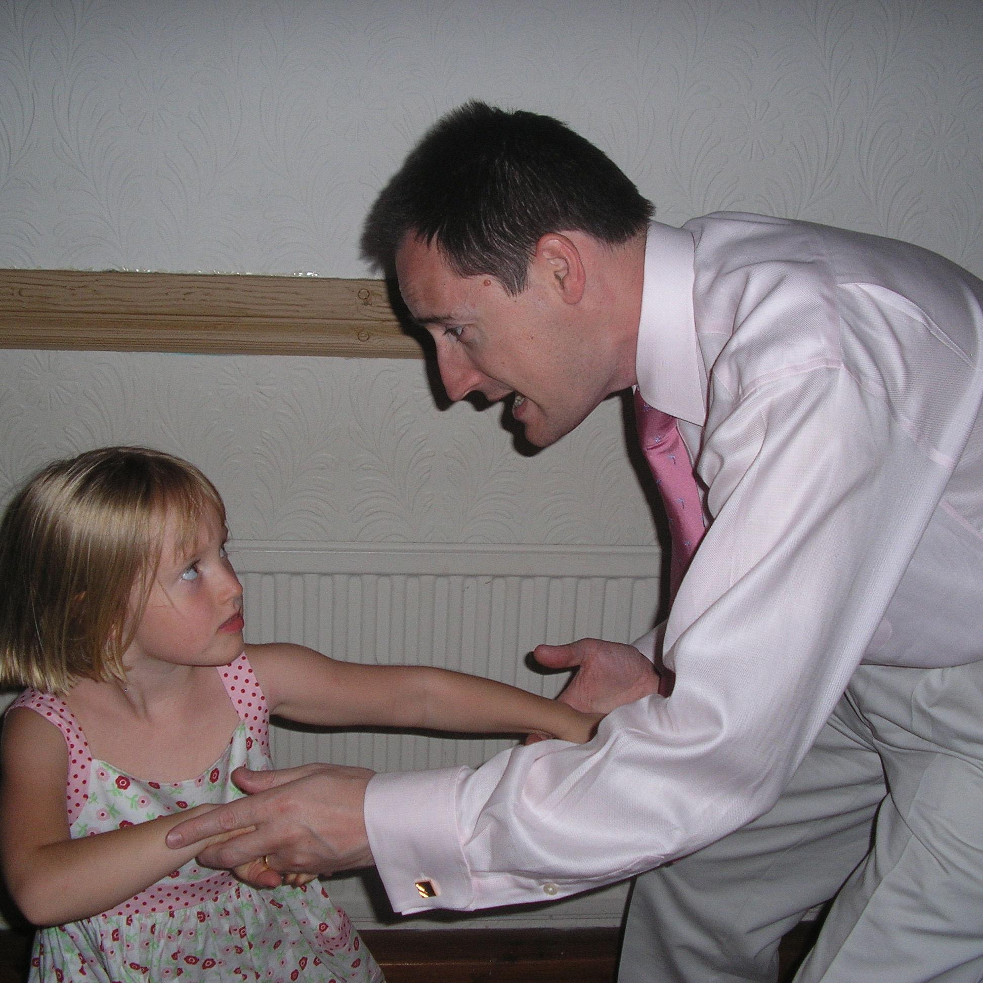 The bride & her father dancing at a loved one's wedding in 2006