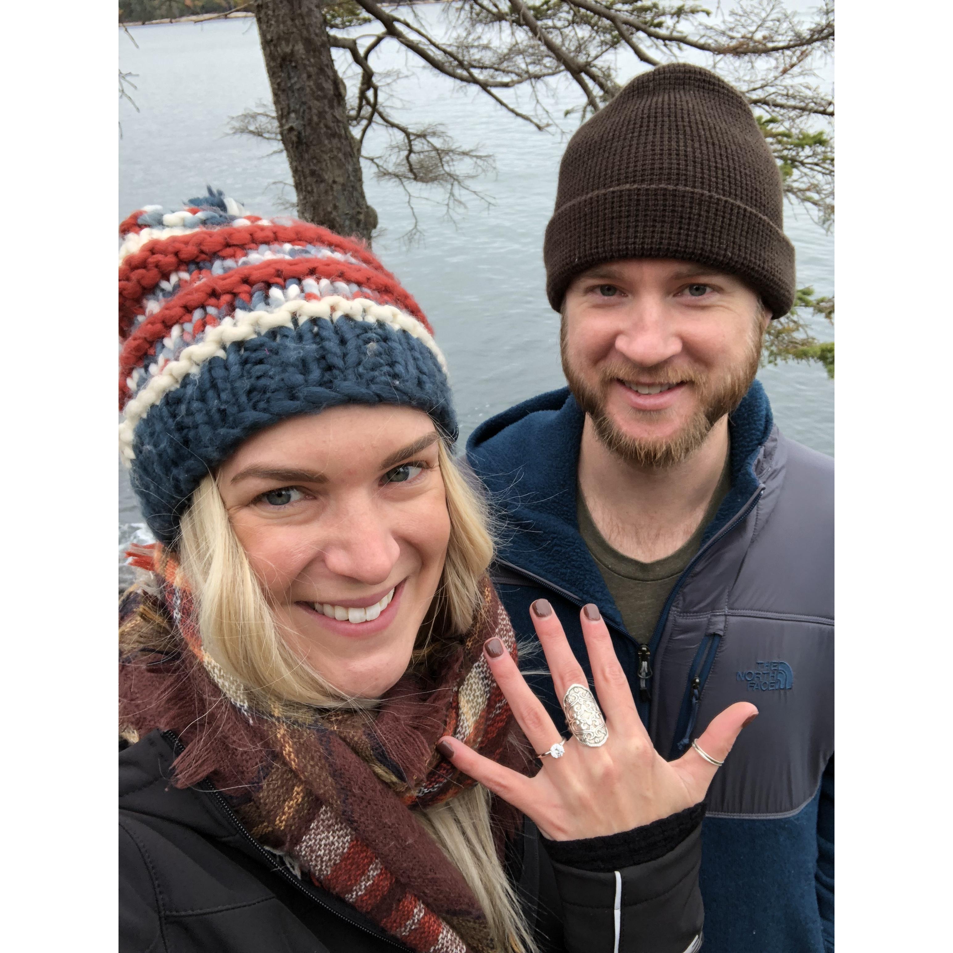The "She said YES" picture. Jesse popped the question in chilly Maine... After 4 amazing days in the NE, he finally worked up the nerve -- 10 MINUTES before departure (car packed and all!).
