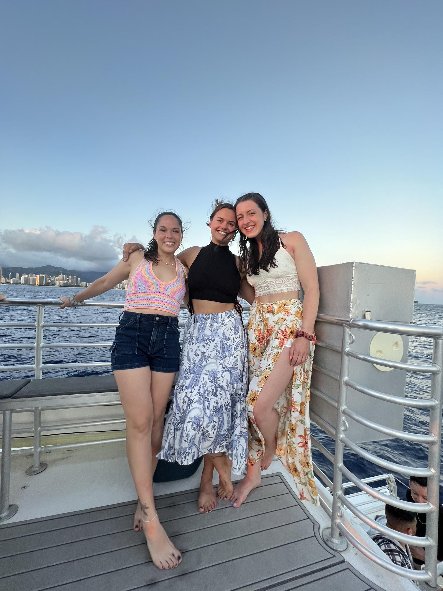 The bride on a boat with her girls