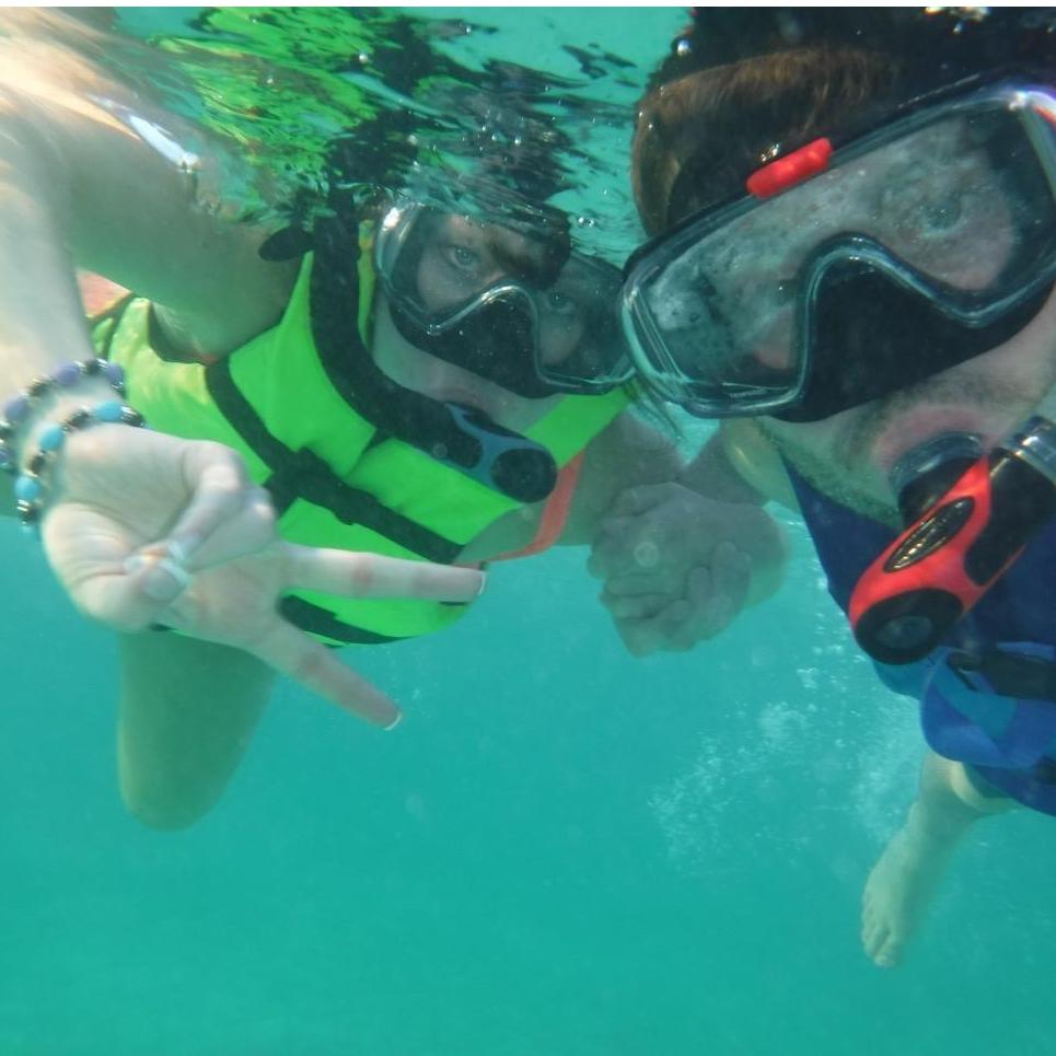 Jeffry teaching Whitney how to snorkel.