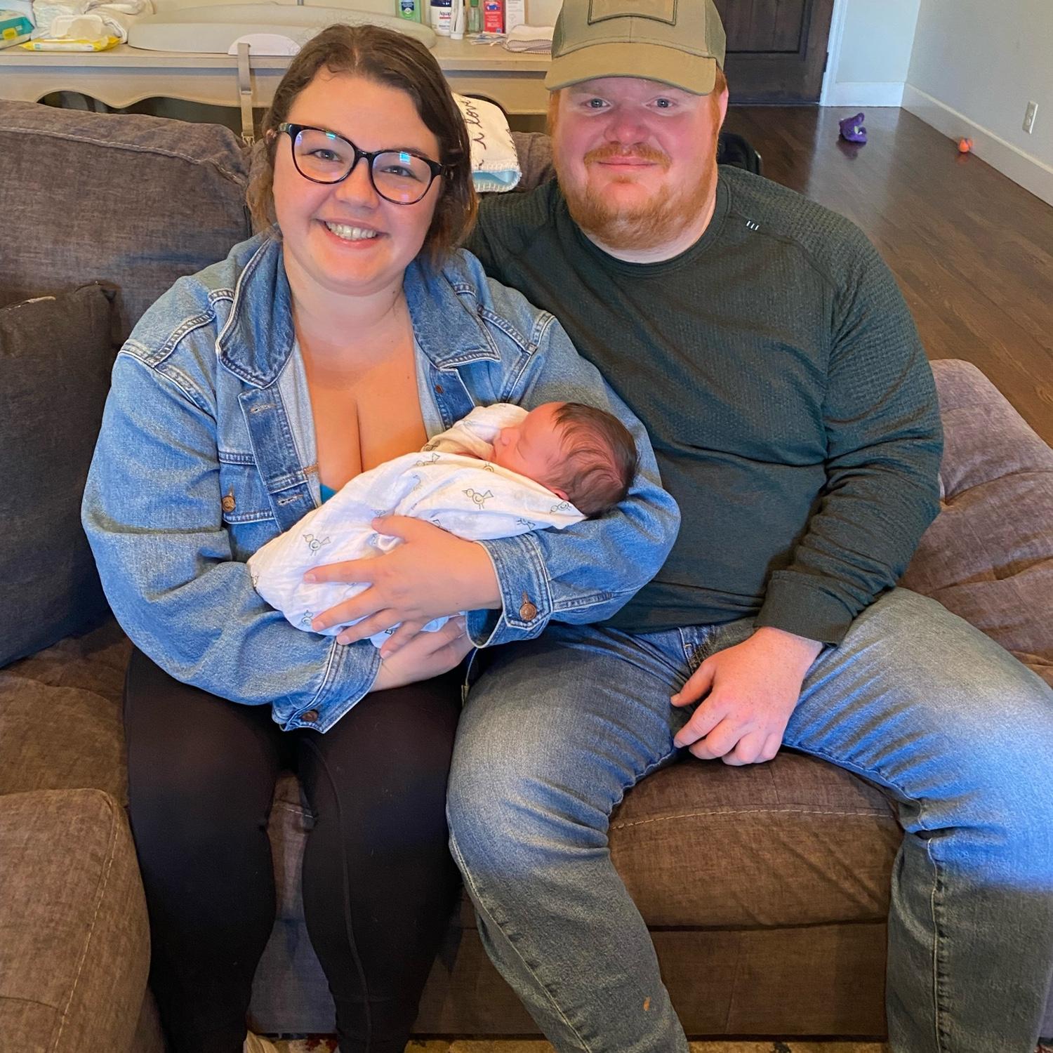 Nov 2024 - Meeting baby Theo for the first time! Aunt Hannah and Uncle Chris on duty!