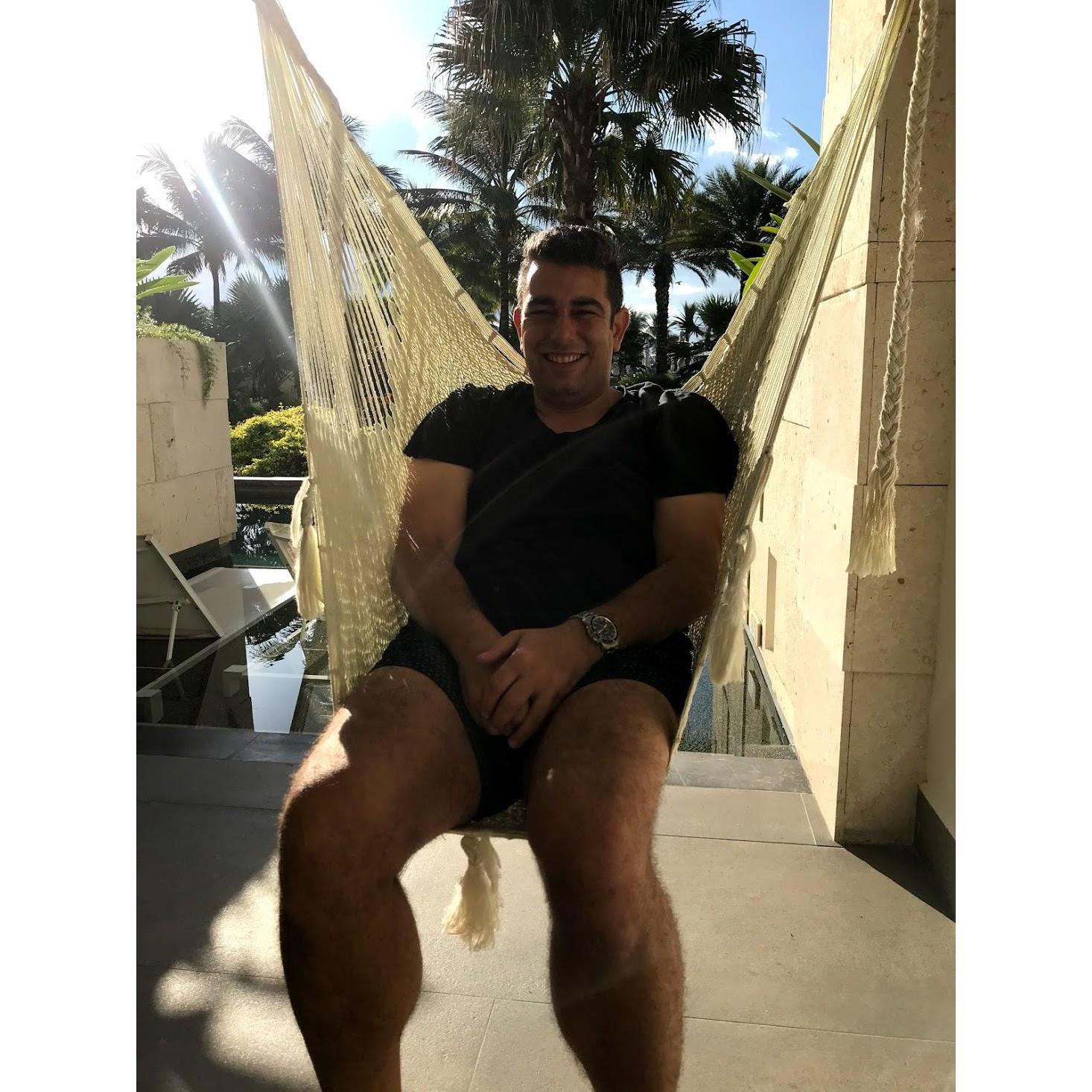 The Room - Dan testing out the hammock chairs :)